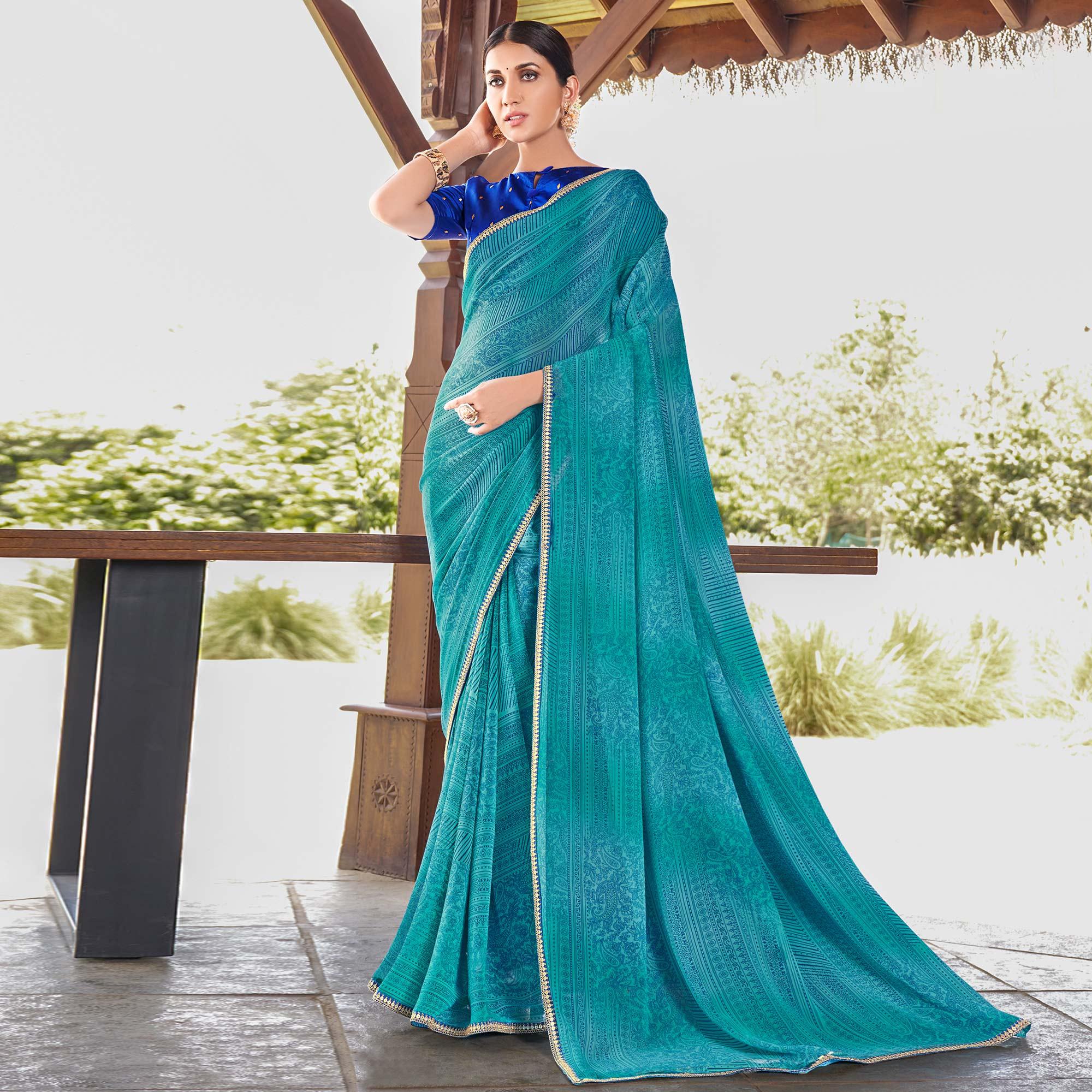 Blue Printed With Sequence Embroidered Border Georgette Saree - Peachmode
