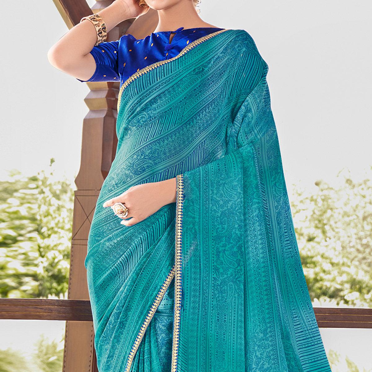 Blue Printed With Sequence Embroidered Border Georgette Saree - Peachmode