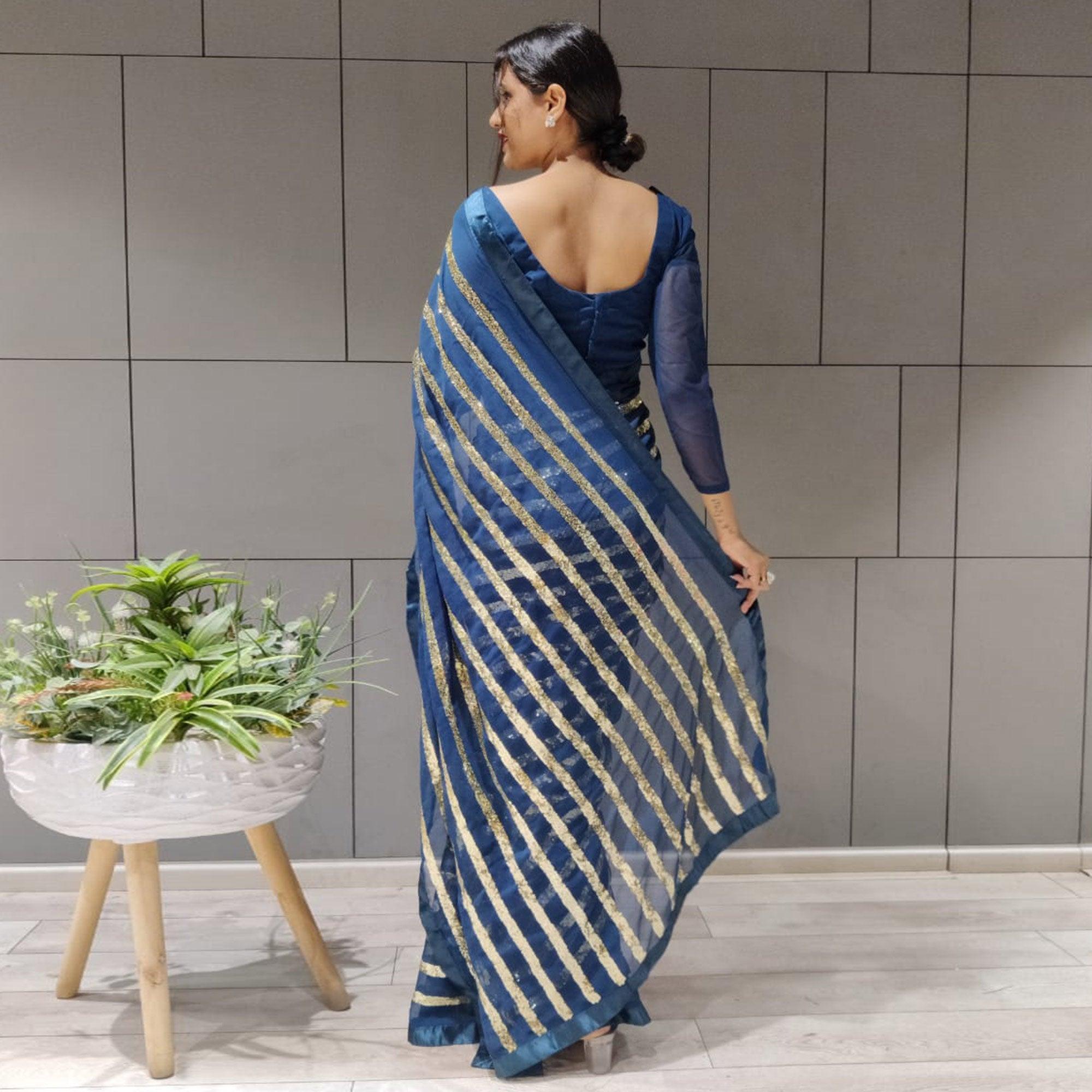 Blue Sequence Embroidered With Stripes Georgette Saree - Peachmode