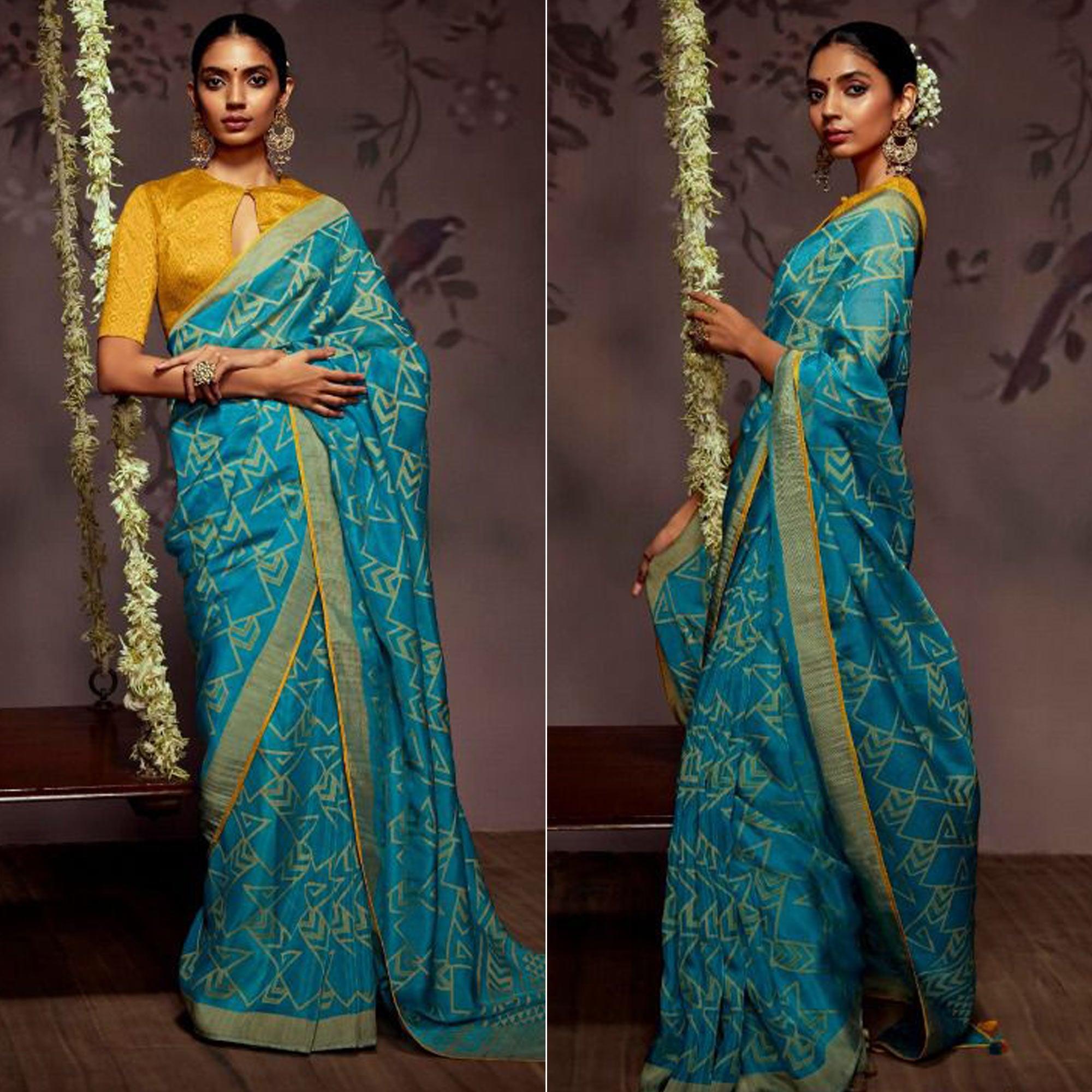 Blue Woven Brasso Saree With Tassels - Peachmode