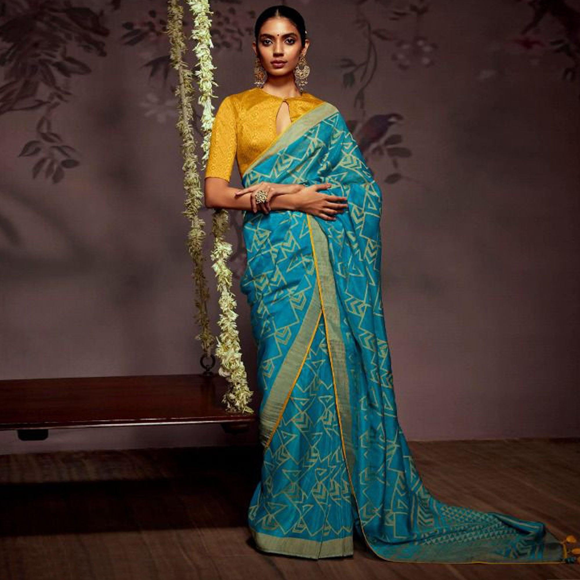 Blue Woven Brasso Saree With Tassels - Peachmode