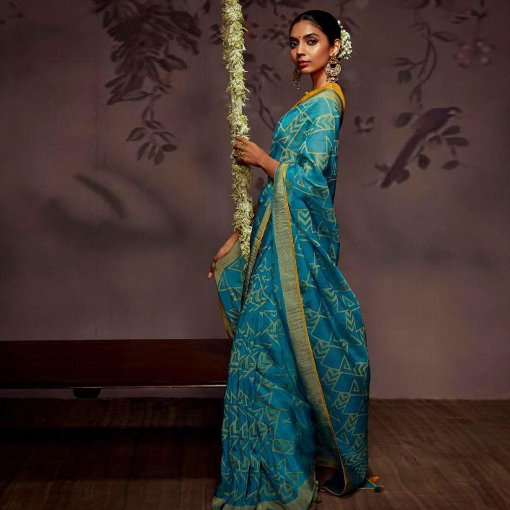Blue Woven Brasso Saree With Tassels - Peachmode