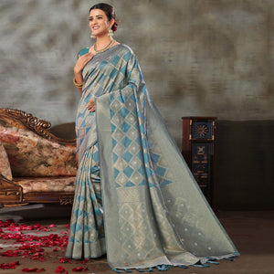 Blue Woven Organza Saree With Tassels - Peachmode