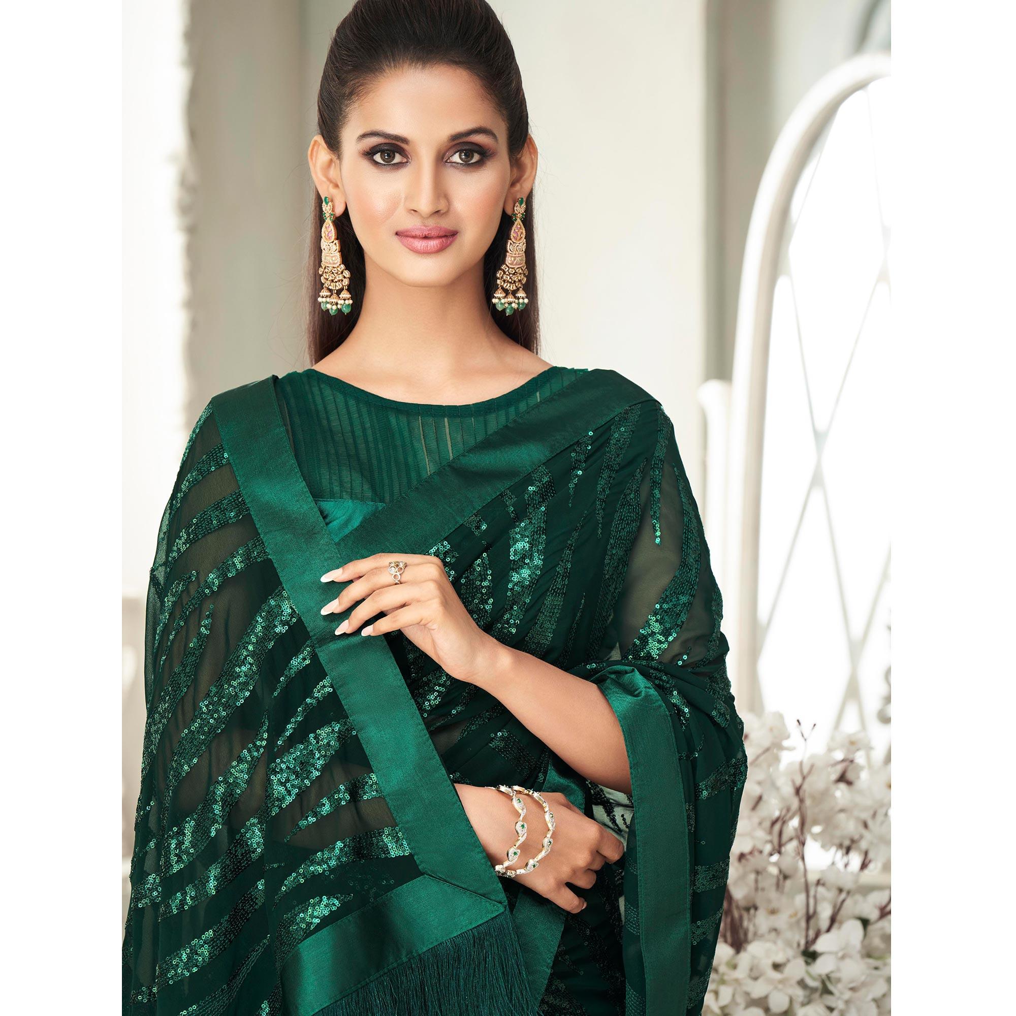 Bottle Green Sequence Embroidered Georgette Saree With Tassels - Peachmode