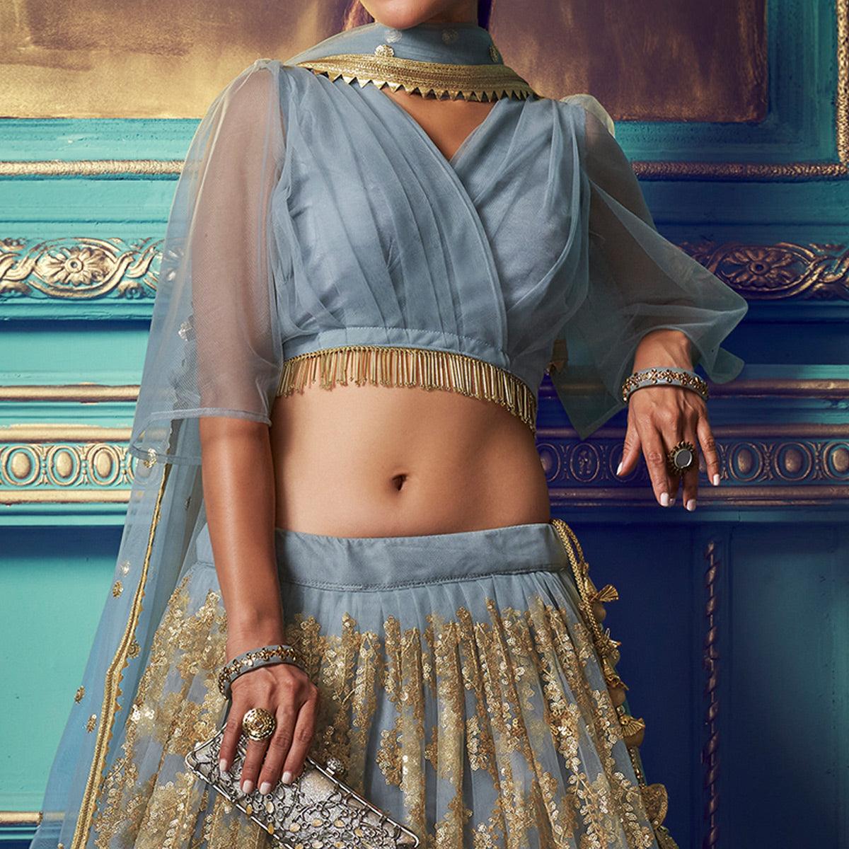 Breathtaking Grey Colored Partywear Embroidered Soft Net Lehenga Choli - Peachmode