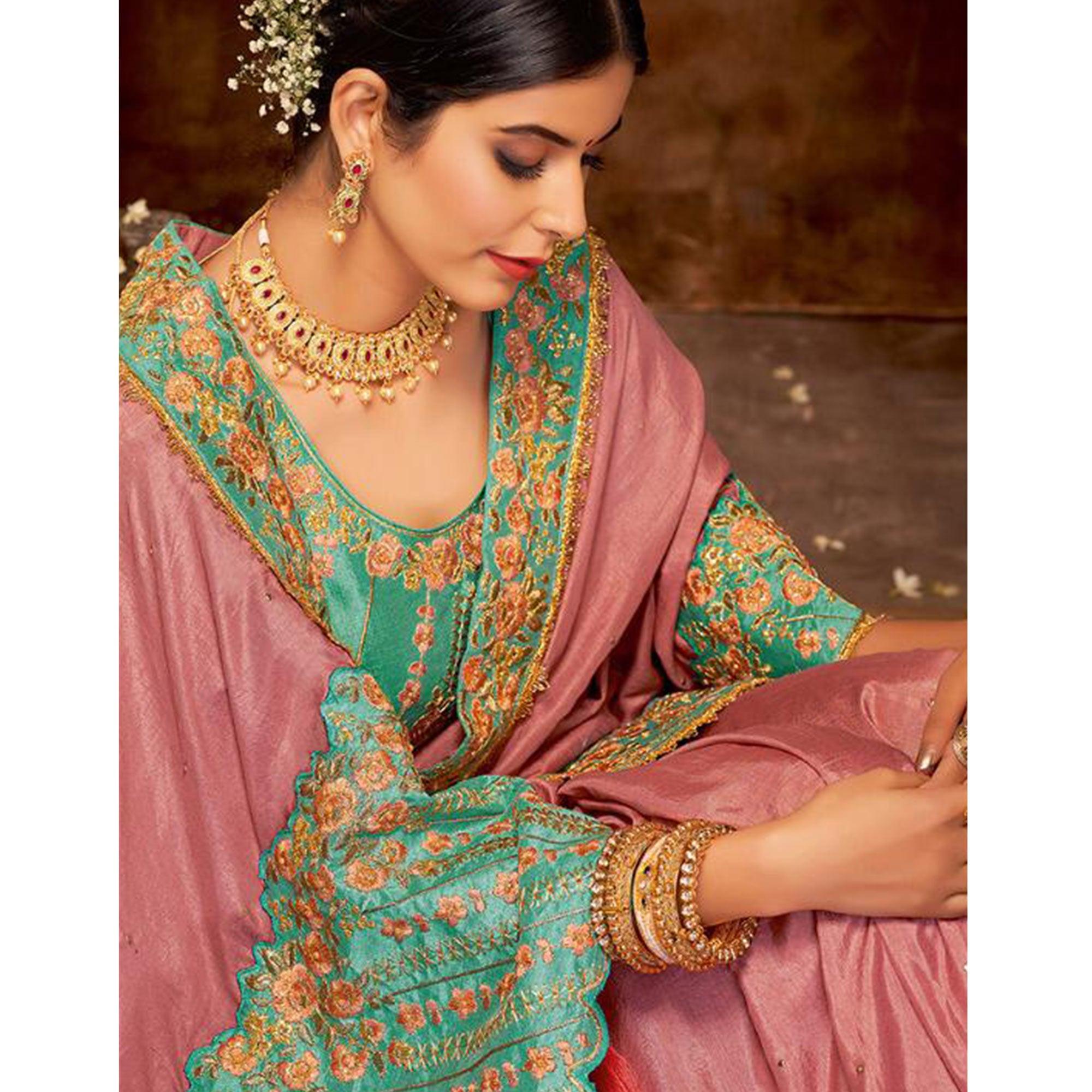 Breathtaking Mauve Colored Partywear Embroidered Silk-Georgette Saree - Peachmode