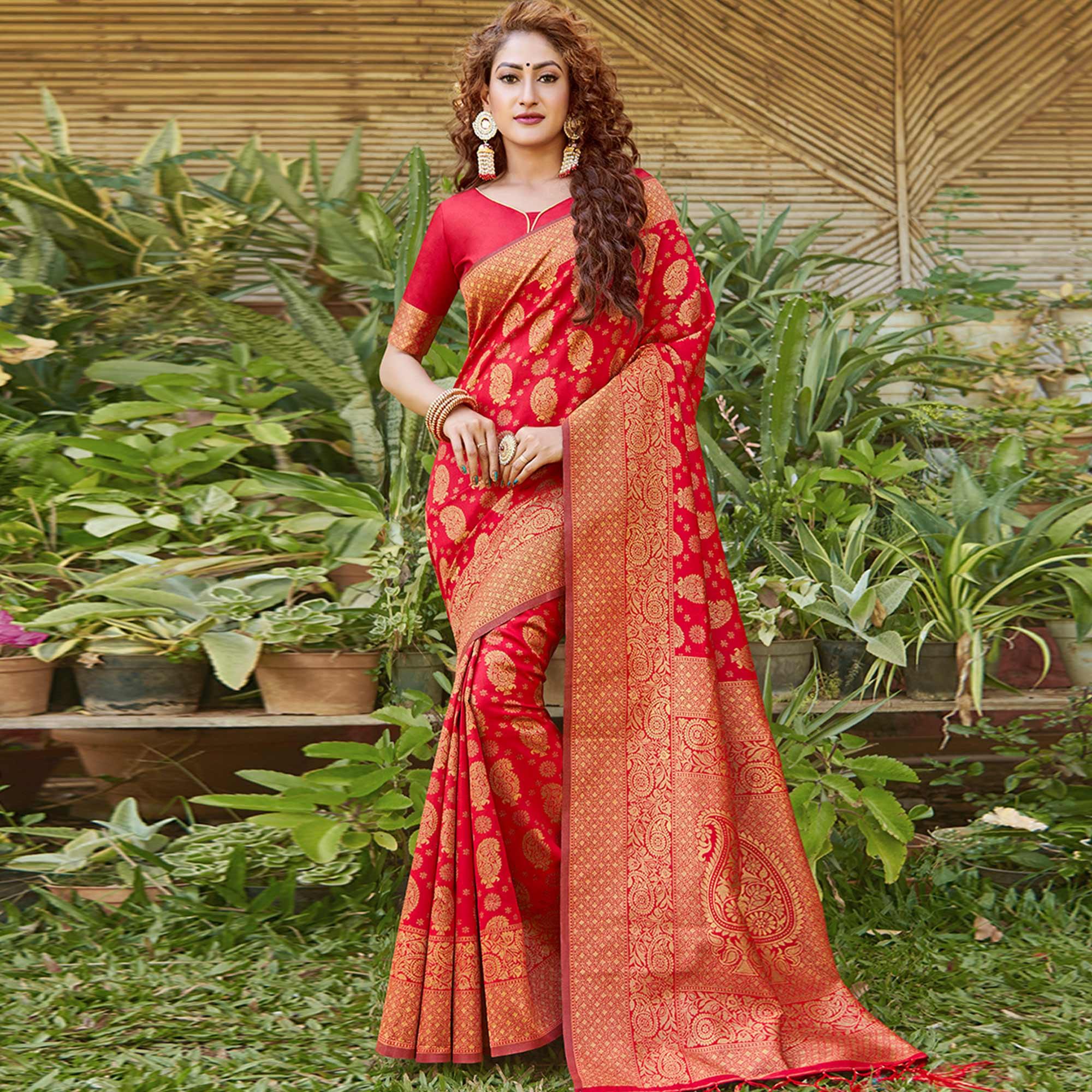 Breathtaking Red Colored Festive Wear Paisely Woven Silk Blend Saree With Tassels - Peachmode