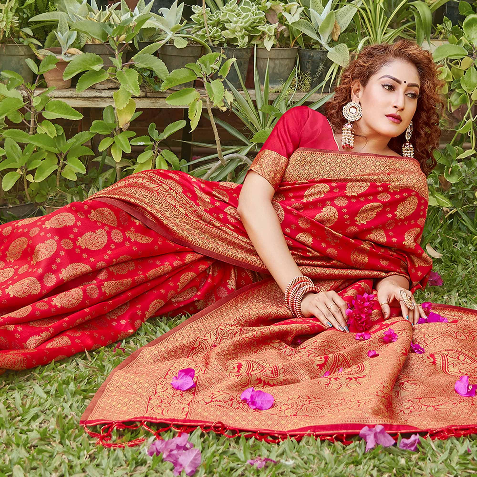 Breathtaking Red Colored Festive Wear Paisely Woven Silk Blend Saree With Tassels - Peachmode