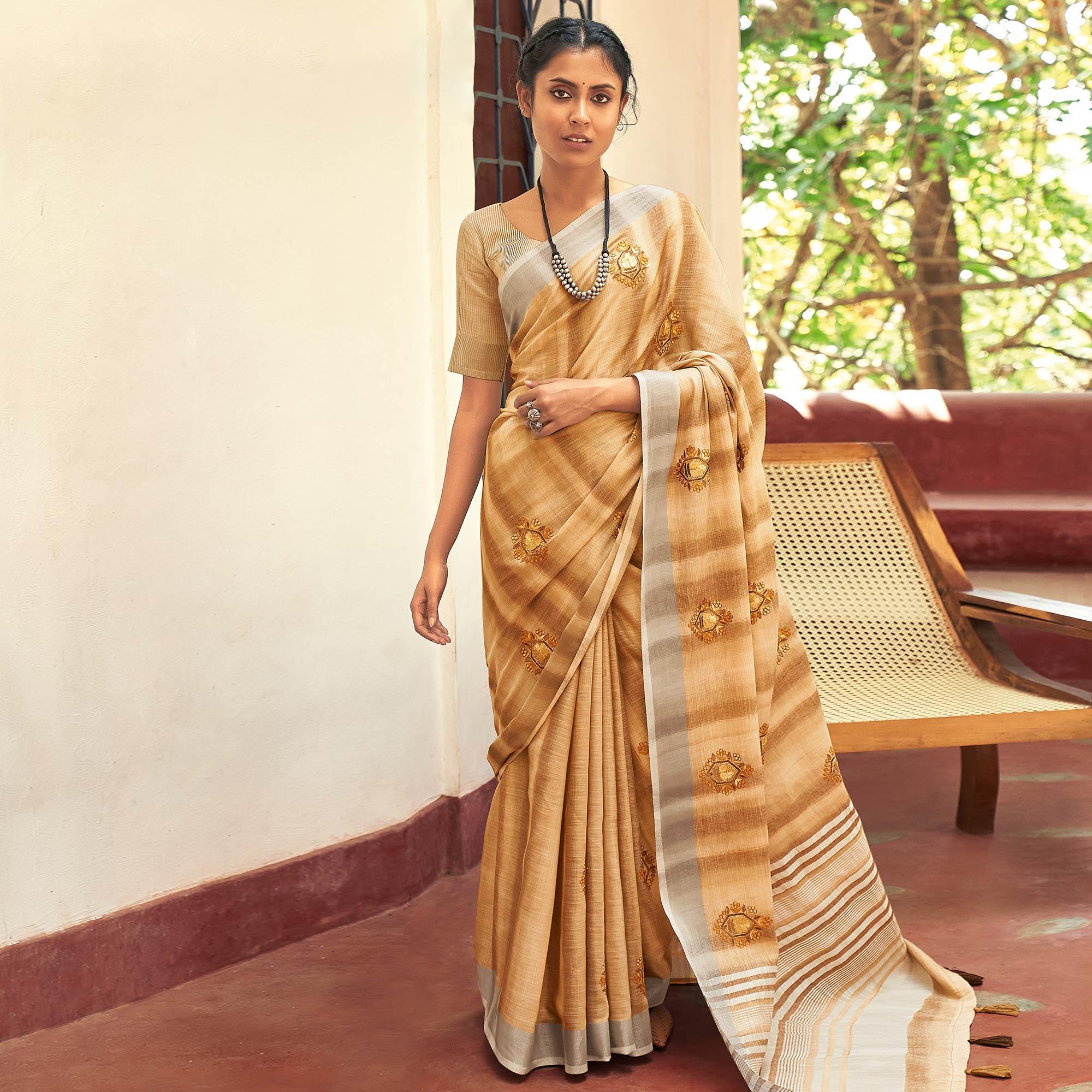 Brown Casual Wear Embroidered Linen Saree With Tassels - Peachmode