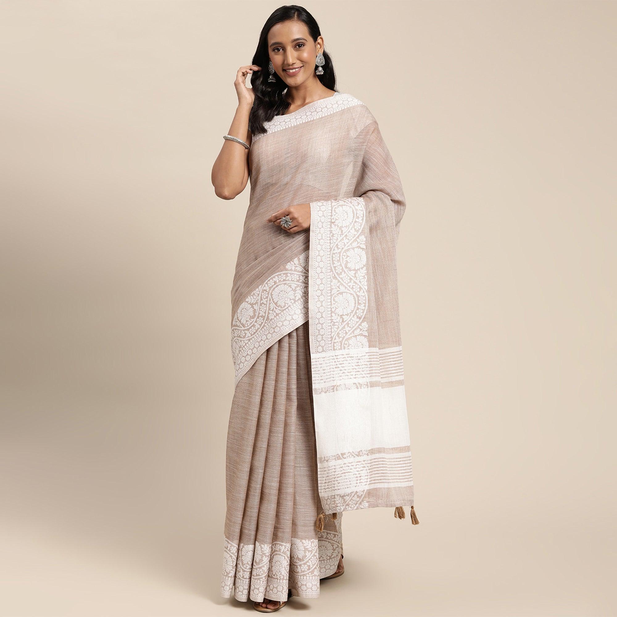 Brown Embroidered Linen Saree with Tassels - Peachmode