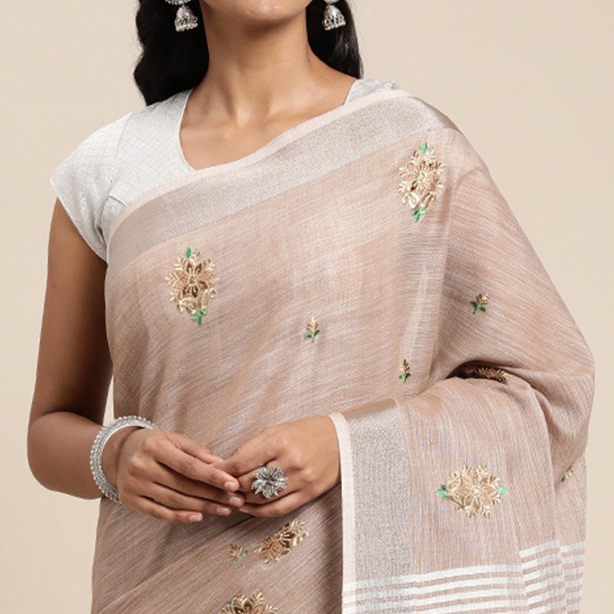 Brown Embroidered Linen Saree With Tassels - Peachmode