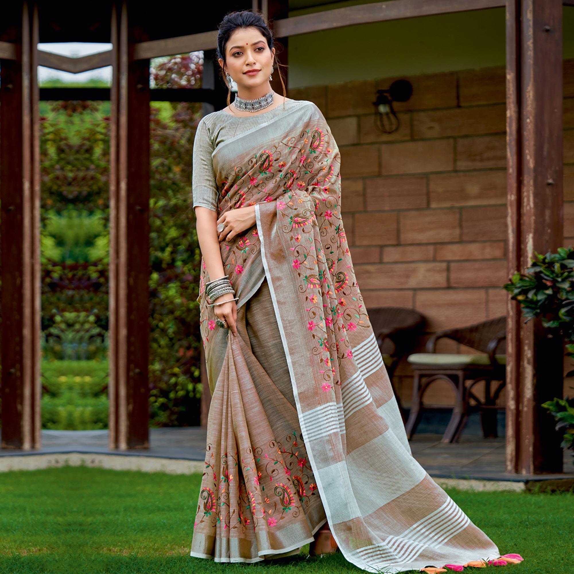 Brown Floral Embroidered Linen Saree With Tassels - Peachmode