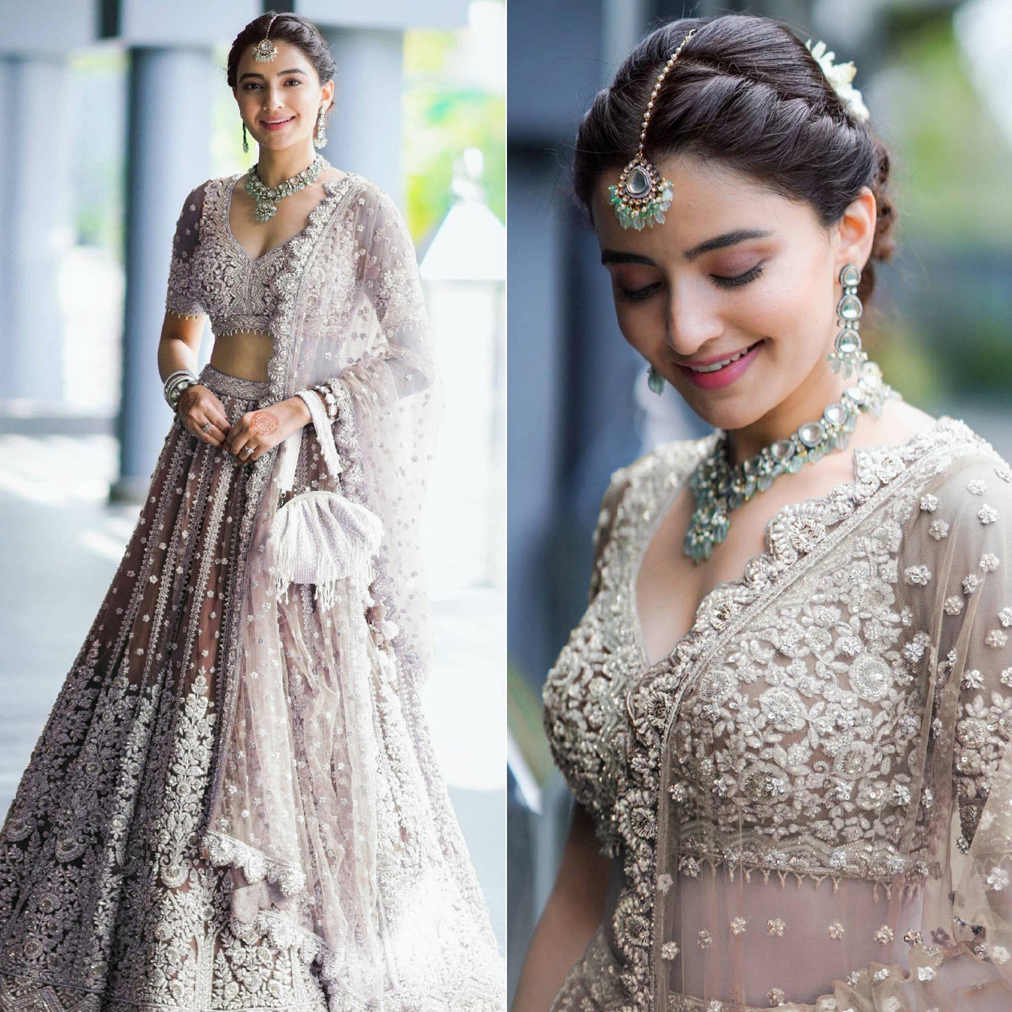 Brown Party Wear Heavy Embroidered Netted Lehenga Choli - Peachmode