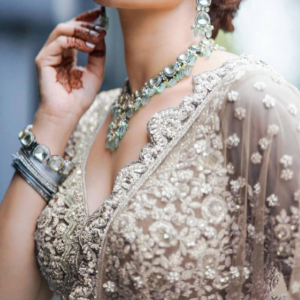 Brown Party Wear Heavy Embroidered Netted Lehenga Choli - Peachmode