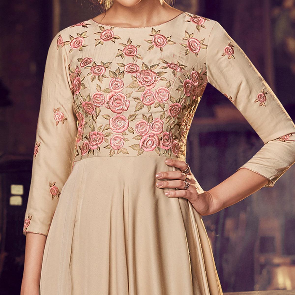 Capricious Chiku Colored Partywear Embroidered Modal Satin Gown With Dupatta - Peachmode