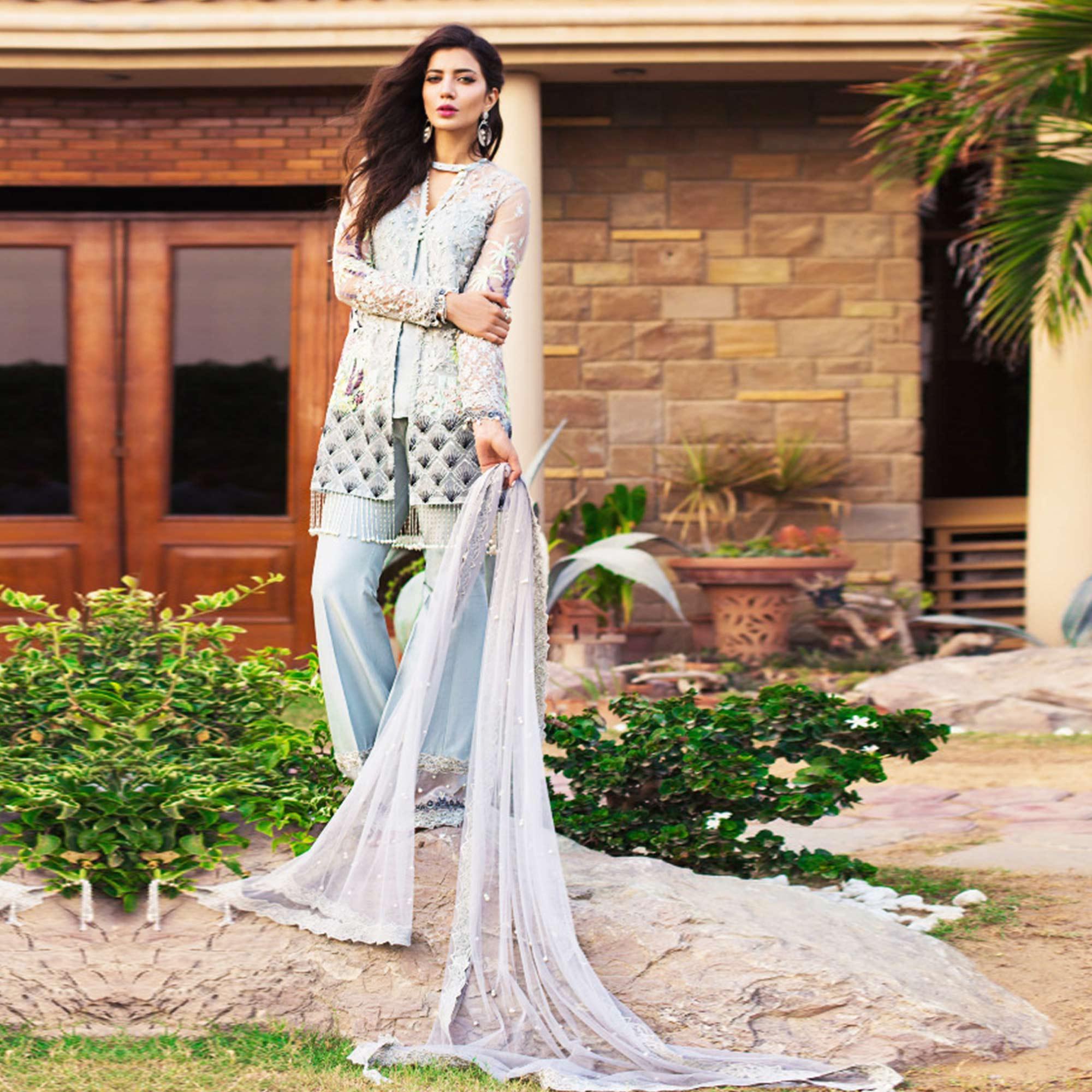 Capricious Light Blue Colored Partywear Embroidered Netted Palazzo Suit - Peachmode