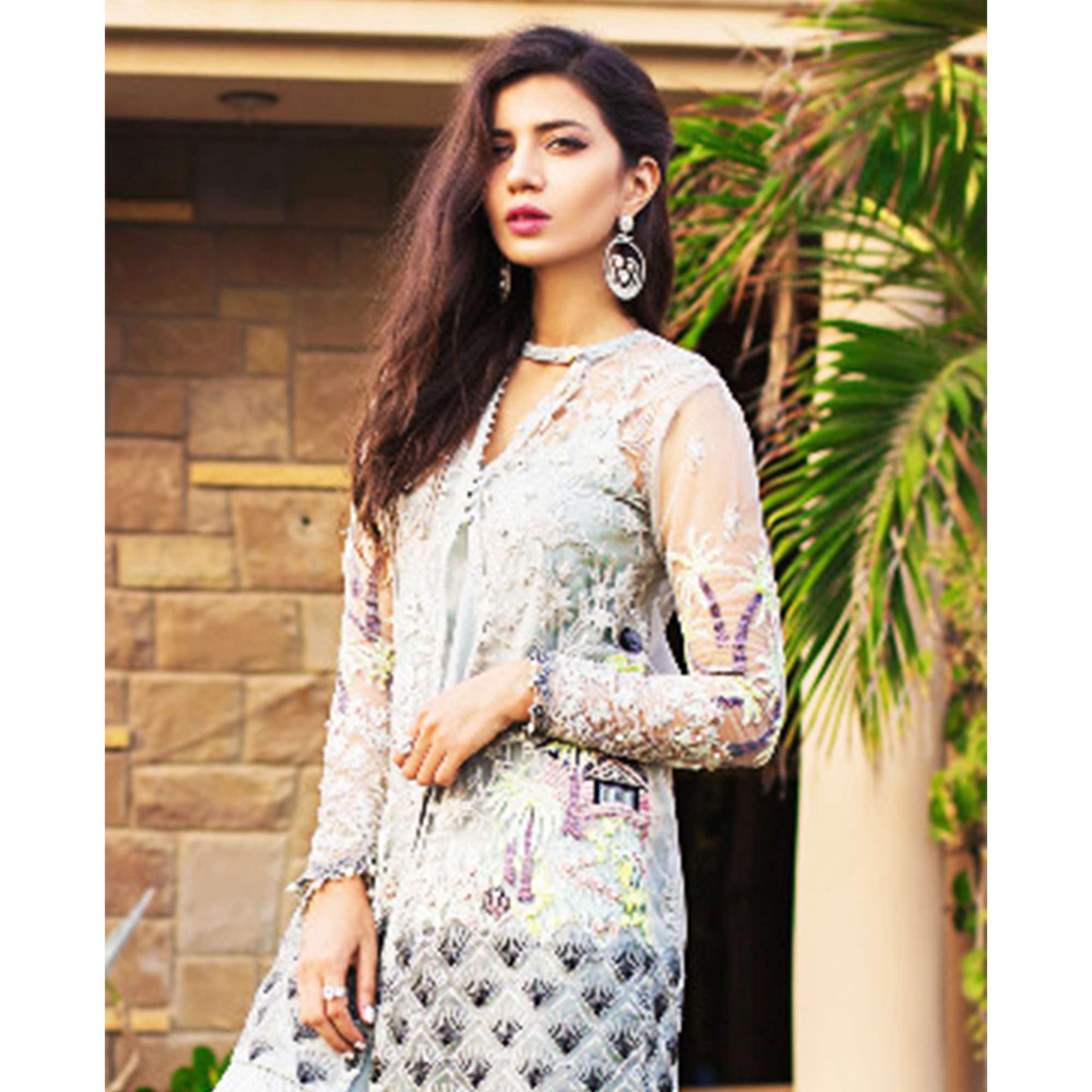 Capricious Light Blue Colored Partywear Embroidered Netted Palazzo Suit - Peachmode
