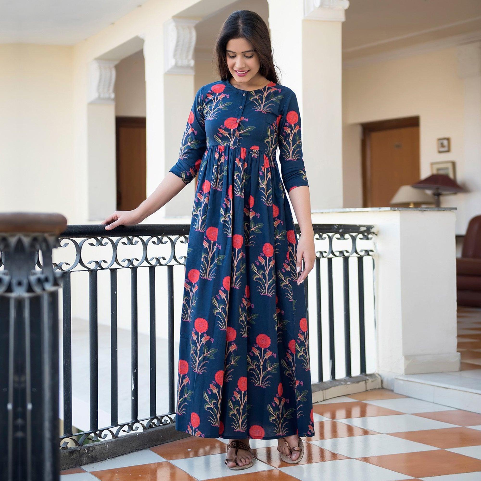 Capricious Navy Blue Colored Casual Printed Muslin Blend Gown - Peachmode