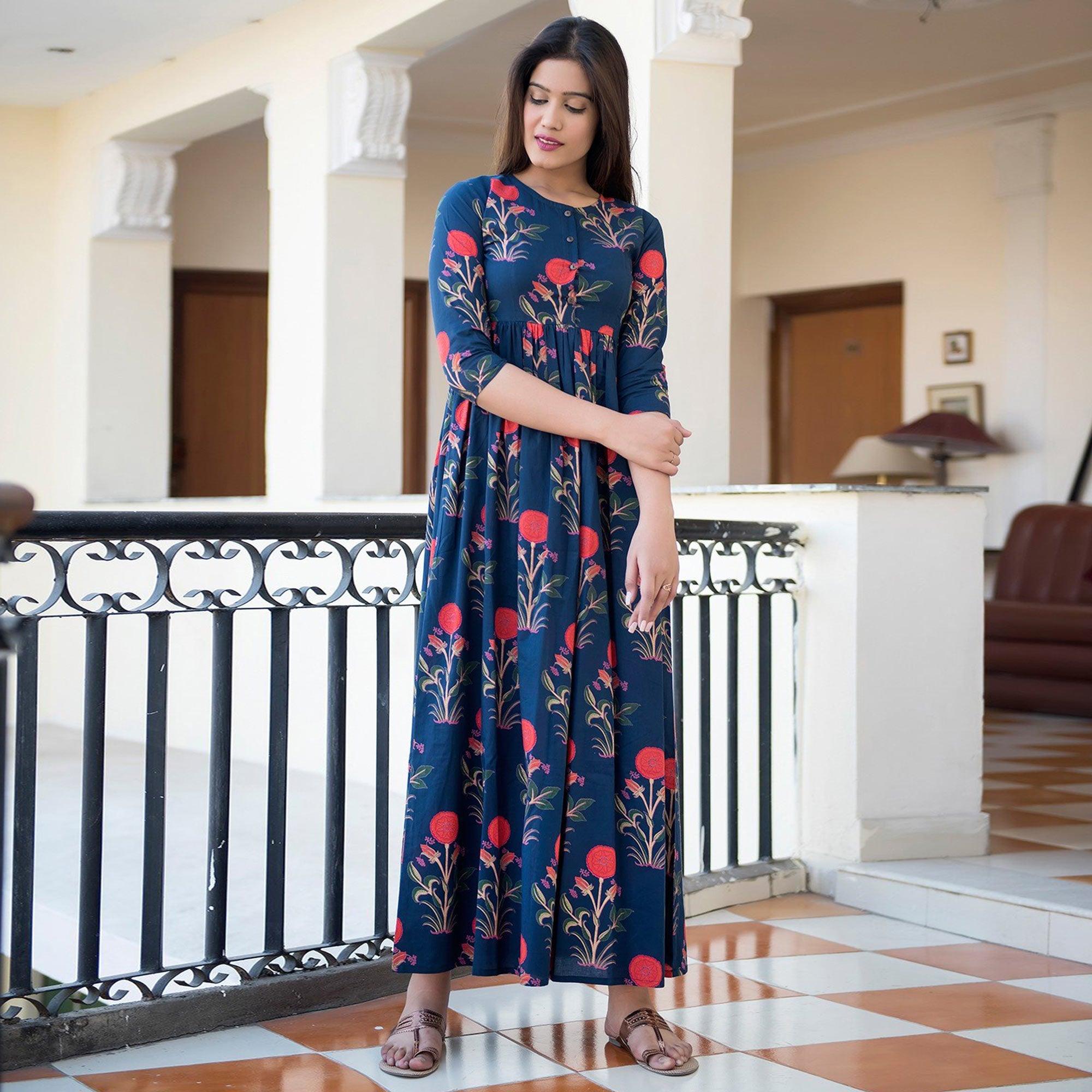 Capricious Navy Blue Colored Casual Printed Muslin Blend Gown - Peachmode