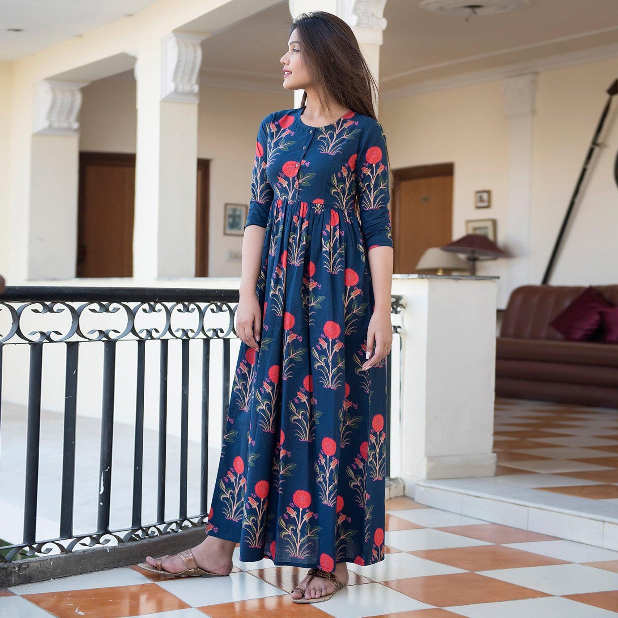Capricious Navy Blue Colored Casual Printed Muslin Blend Gown - Peachmode