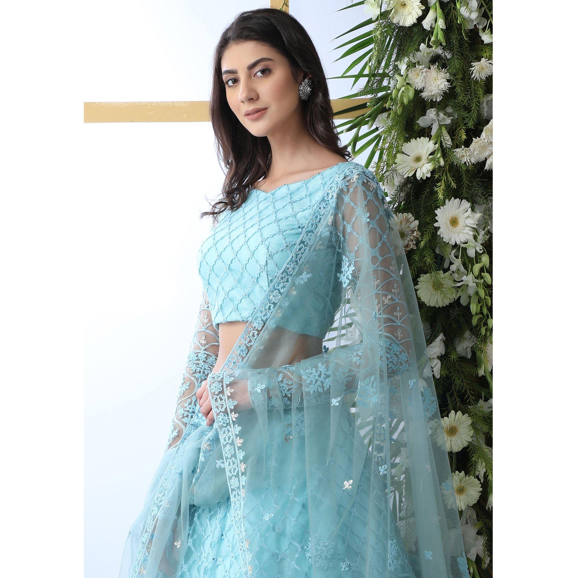 Capricious Sky Blue Colored Partywear Embroidered Netted Lehenga Choli - Peachmode