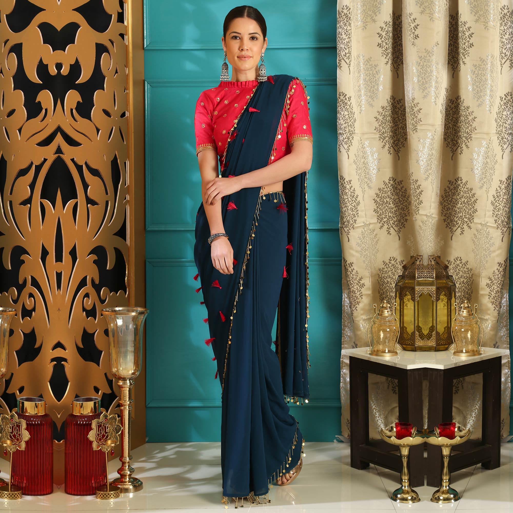 Capricious Teal Blue Colored Party Wear Embroidered Pure Georgette Saree - Peachmode