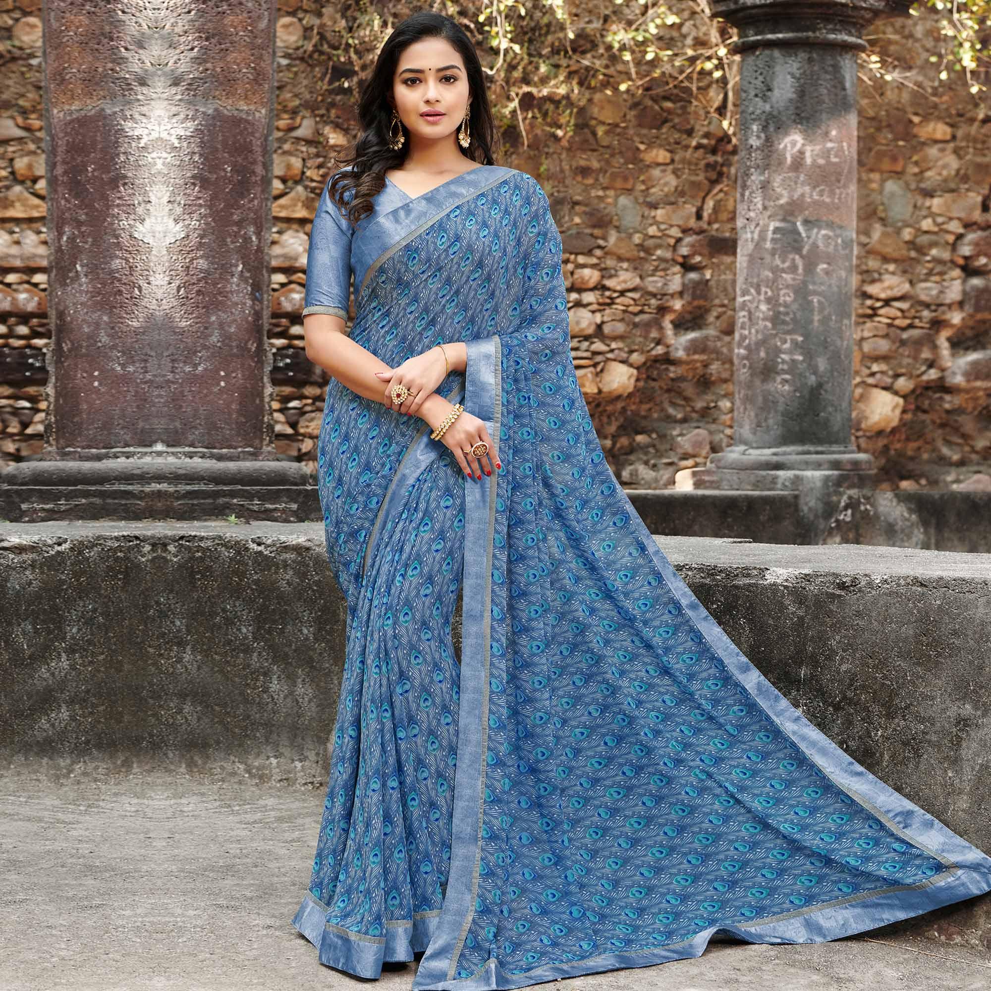 Captivating Blue Colored Casual Floral Printed Georgette Saree - Peachmode