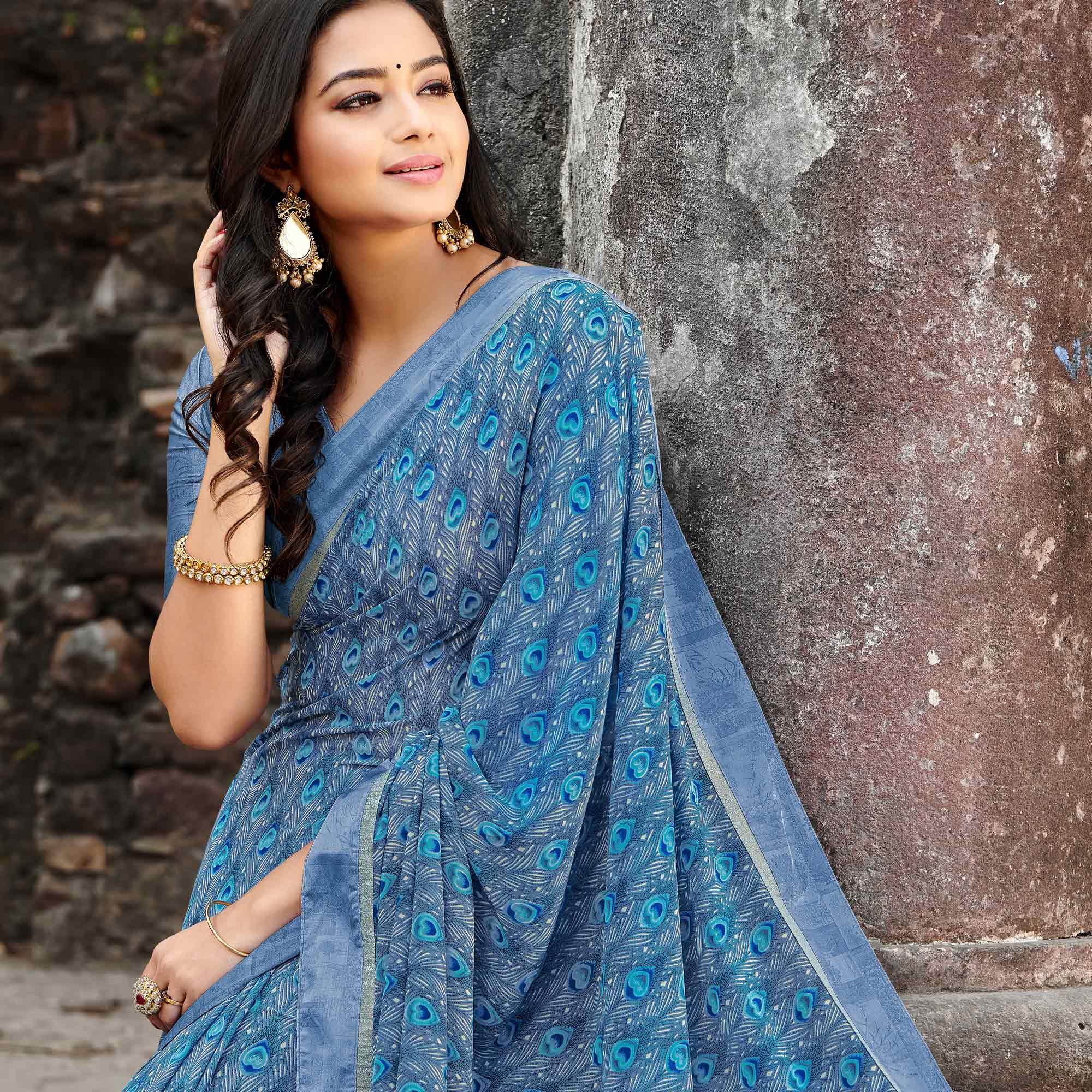 Captivating Blue Colored Casual Floral Printed Georgette Saree - Peachmode