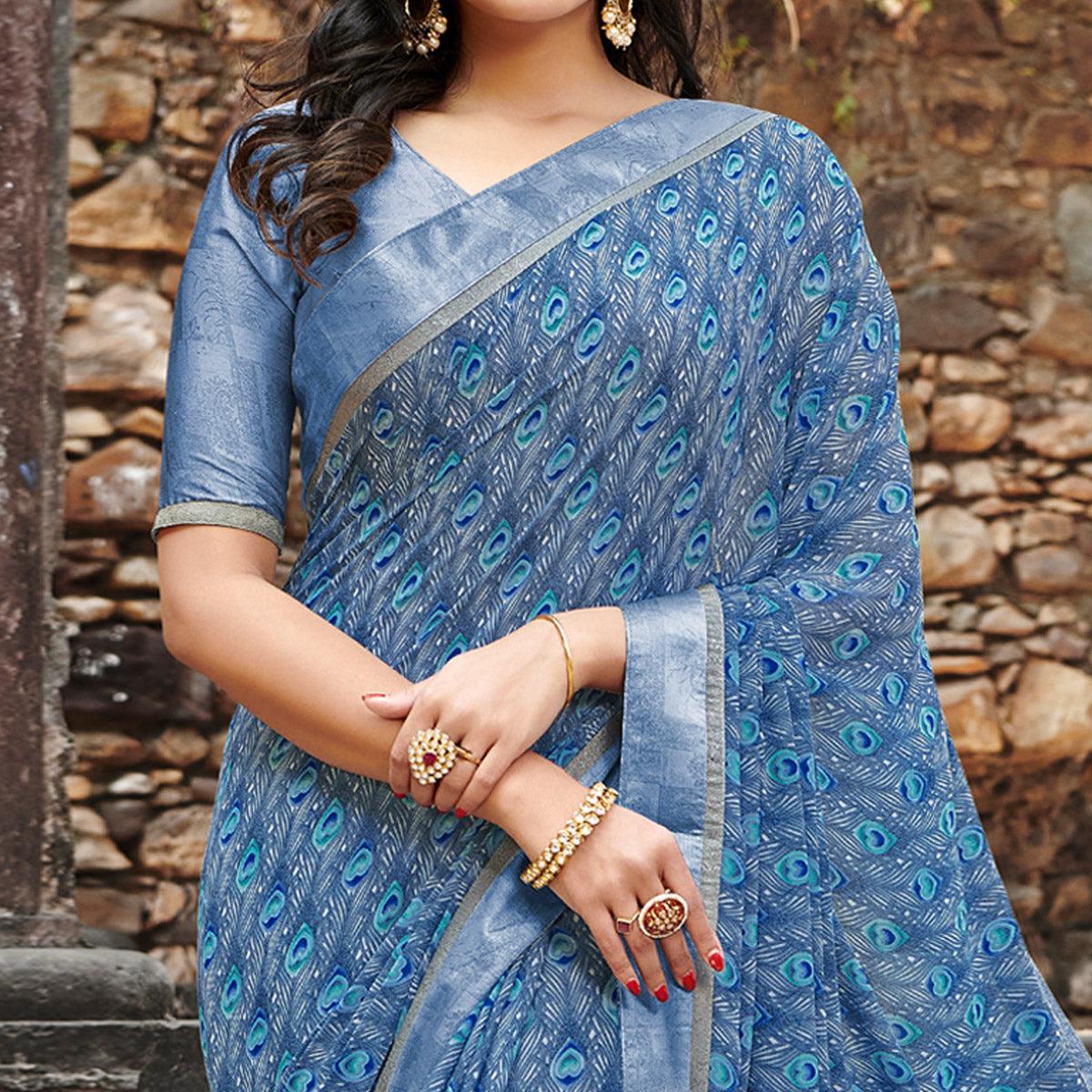 Captivating Blue Colored Casual Floral Printed Georgette Saree - Peachmode