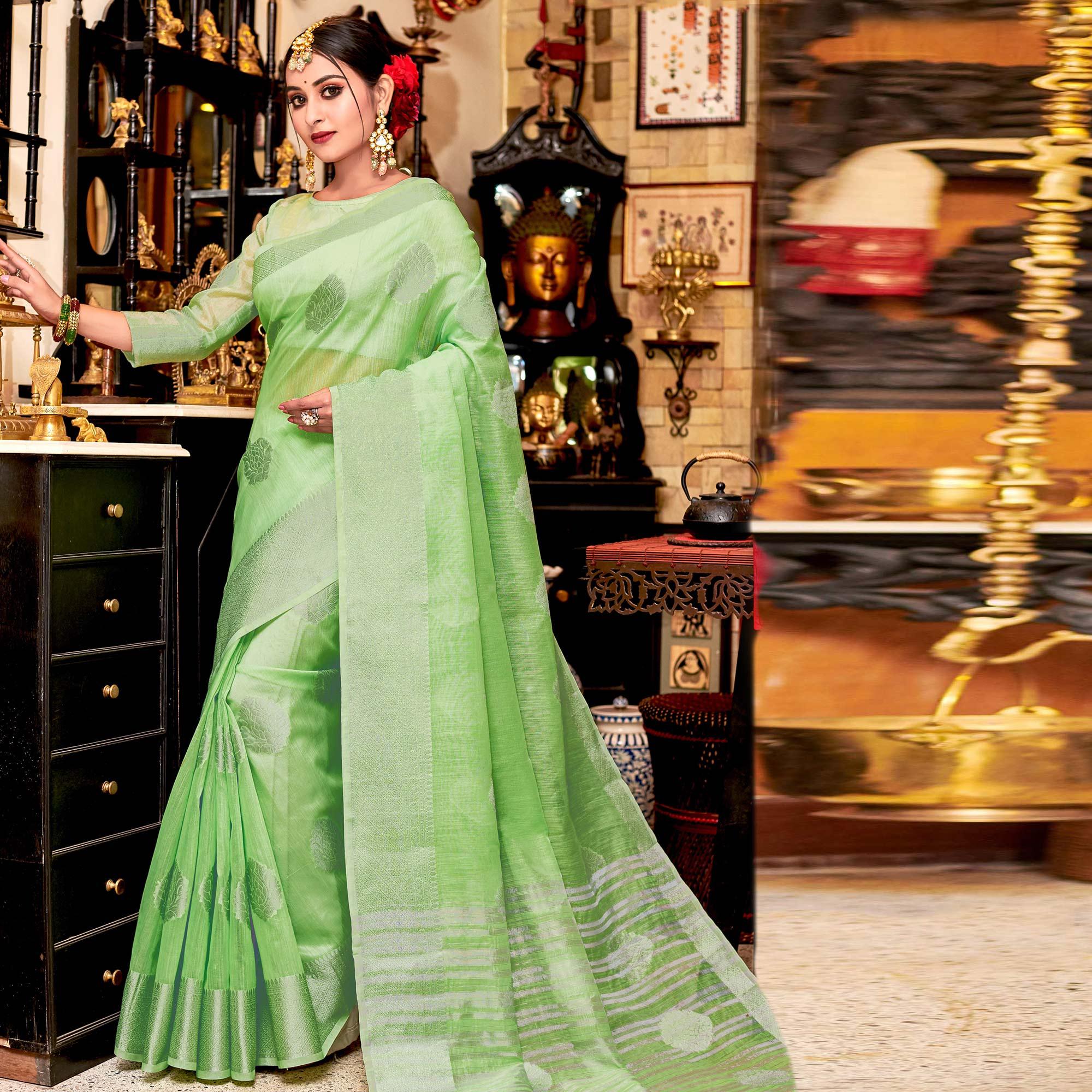Captivating Green Colored Festive Wear Woven Linen Sareee - Peachmode