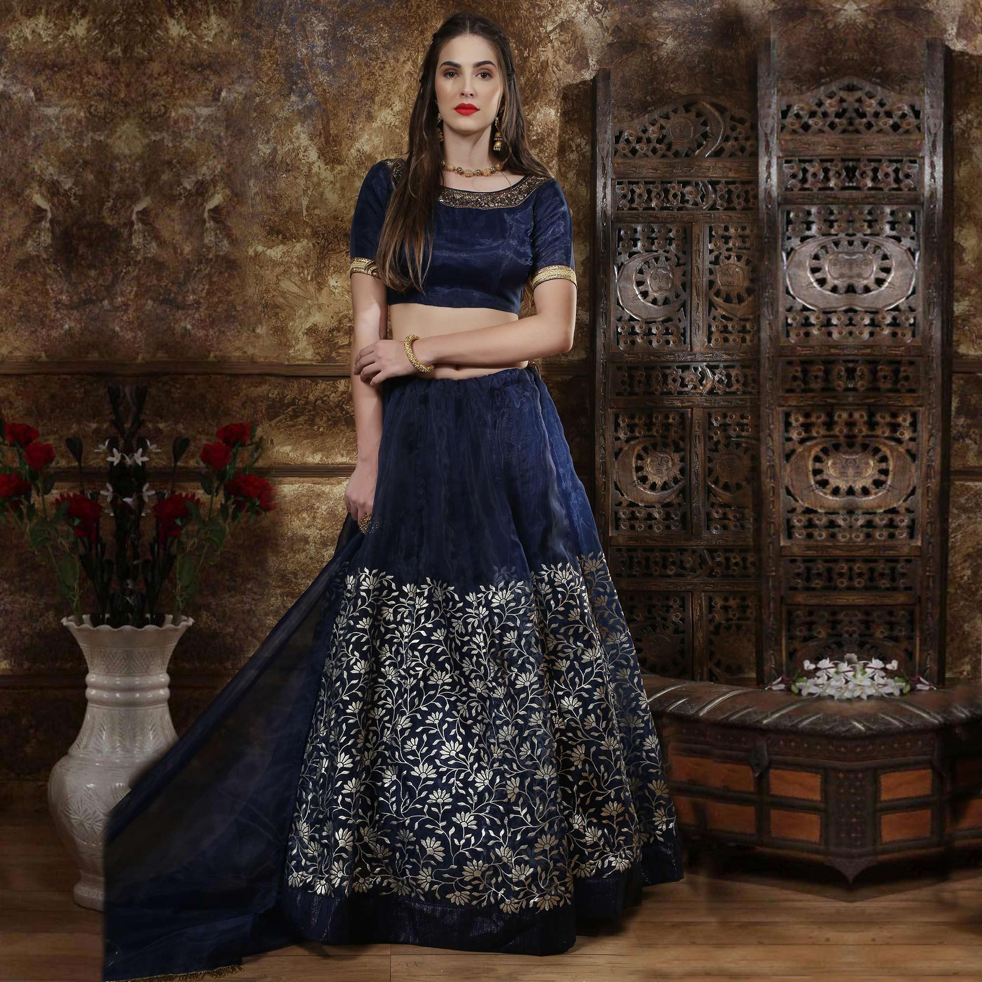 Captivating Navy Blue Colored Party Wear Foil Printed Organza Lehenga Choli - Peachmode