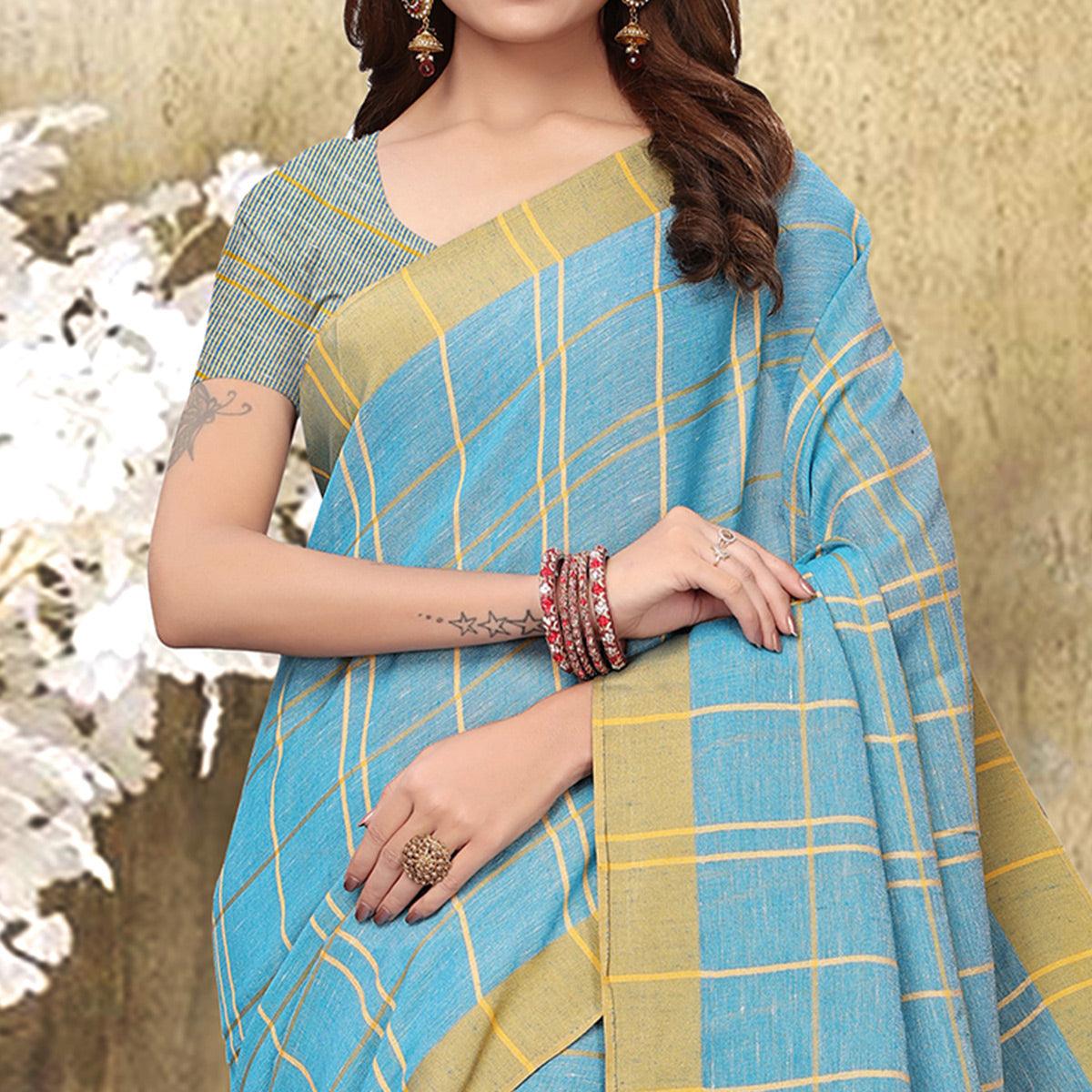 Captivating Sky Blue Colored Festive Wear Checks Print Pure Linen Saree - Peachmode
