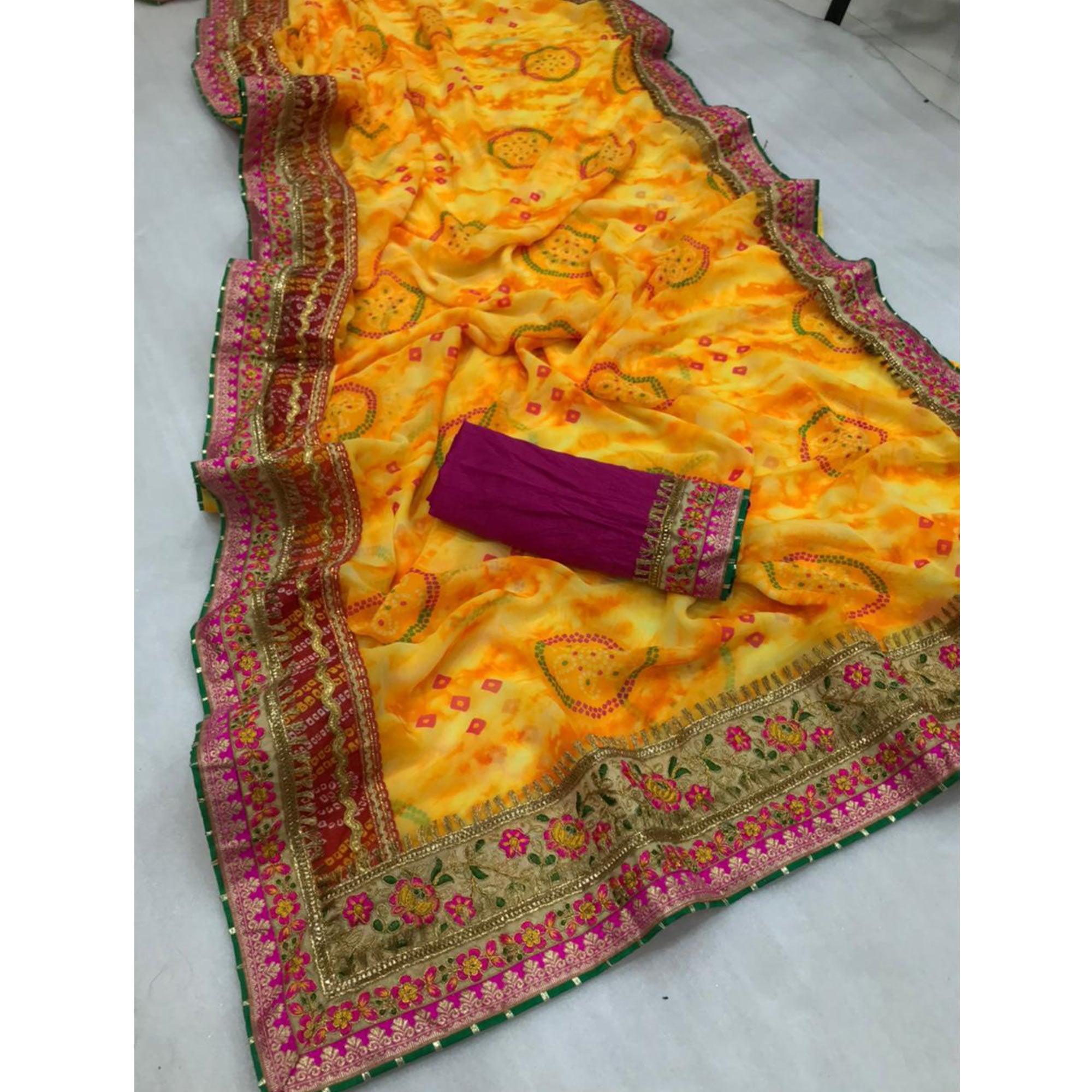 Captivating Yellow Colored Festive Wear Bandhani Print With Zari Border Work And Latkan Heavy Georgette Saree - Peachmode