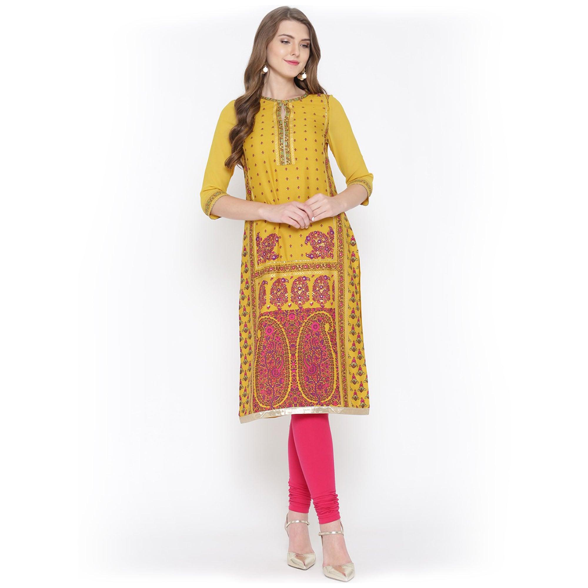 Charismatic Yellow Floral Printed Casual Wear Poly Muslin Kurti - Peachmode