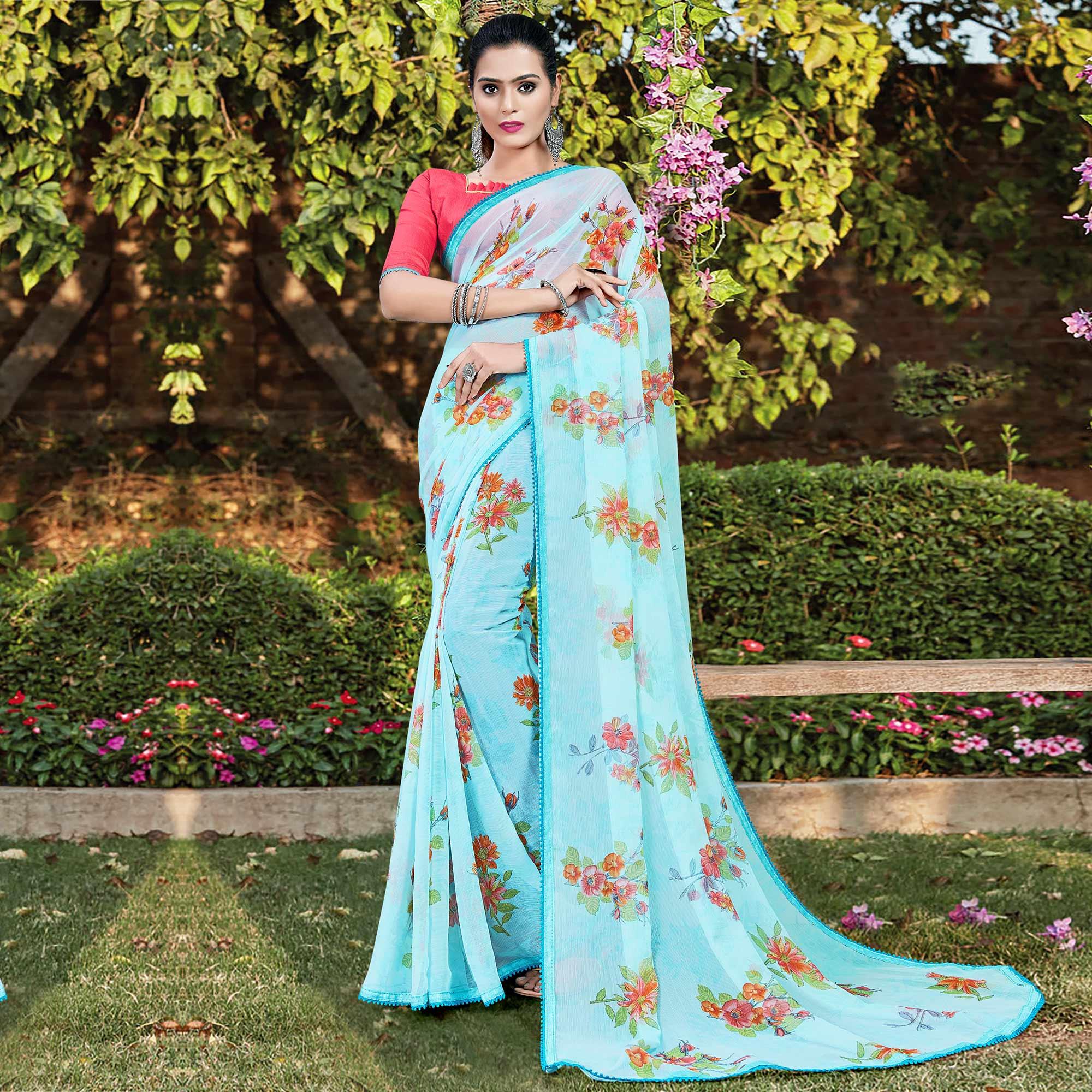 Charming Blue Colored Casual Wear Floral Printed Chiffon Saree - Peachmode