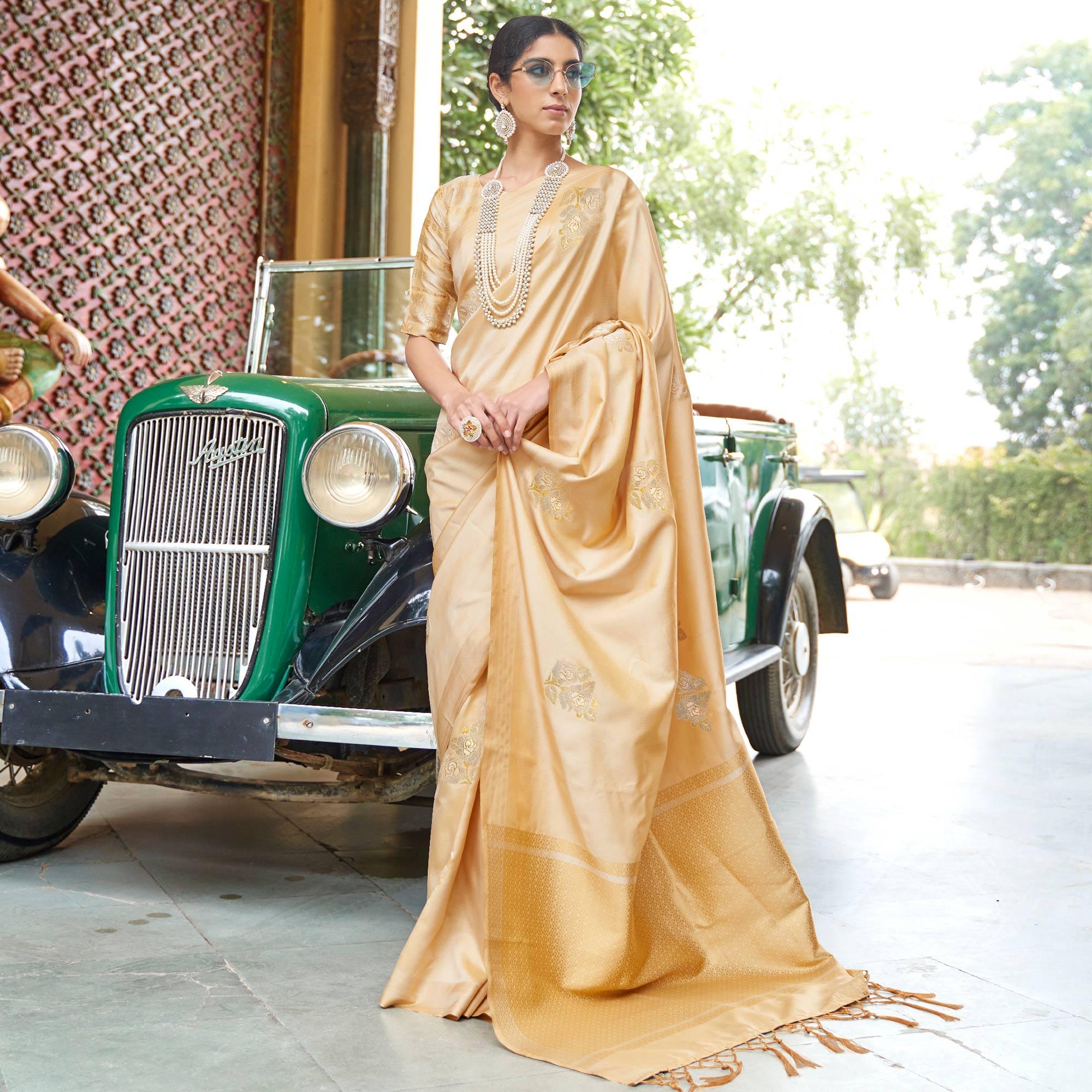 Charming Cream Colored Zari Work Festive Wear Banarasi Silk Saree - Peachmode