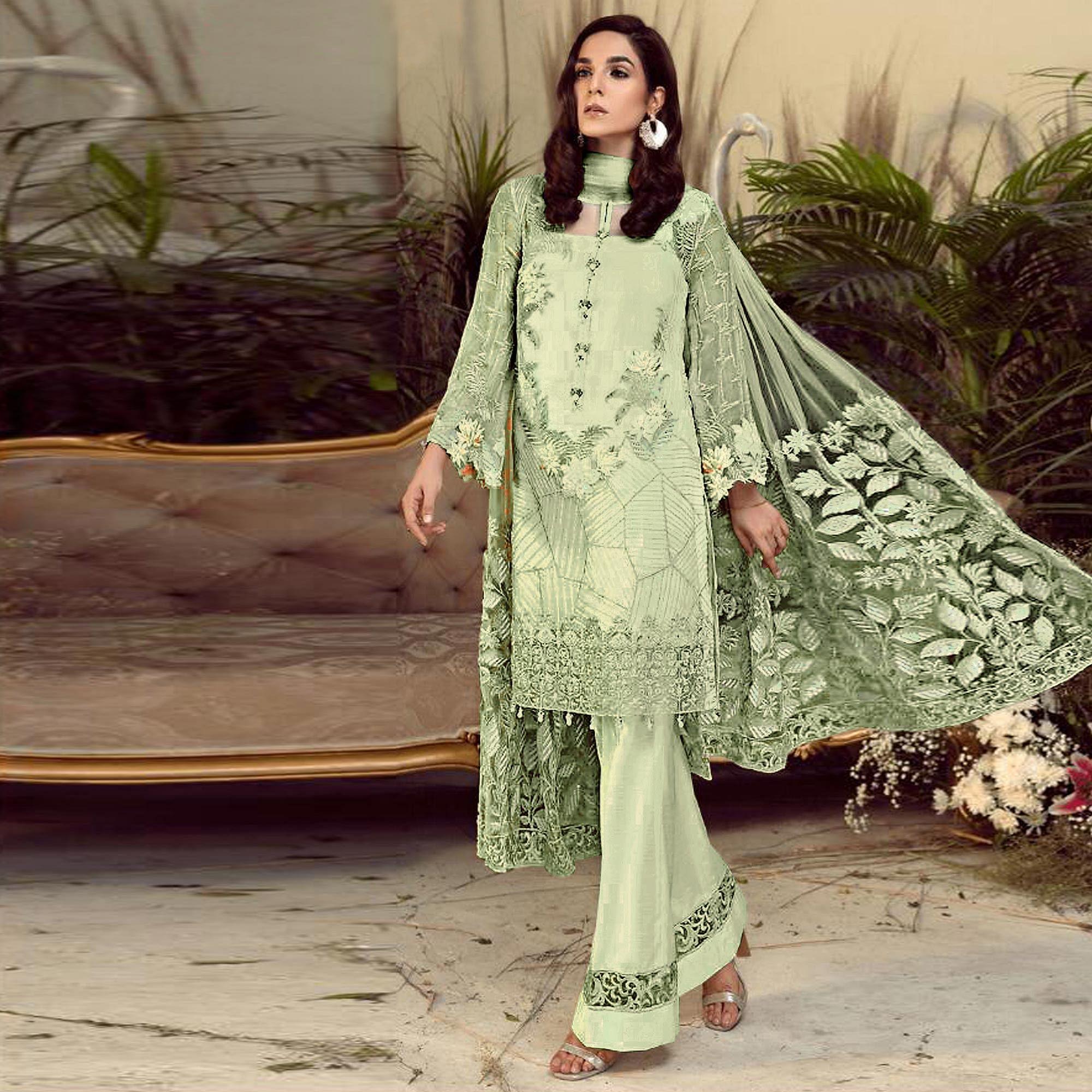 Charming Green Colored Partywear Embroidered Faux Gerogette Straight Suit - Peachmode