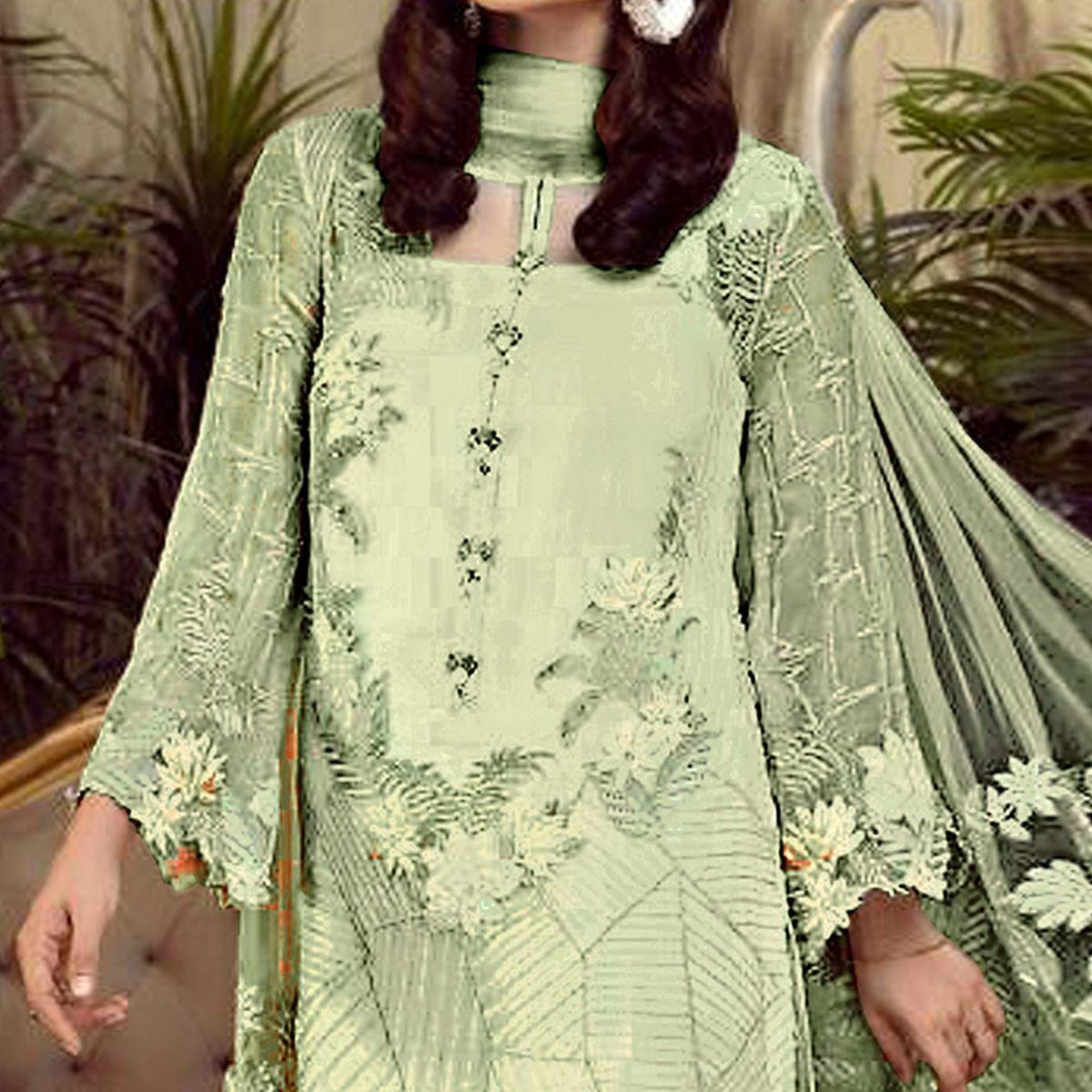 Charming Green Colored Partywear Embroidered Faux Gerogette Straight Suit - Peachmode