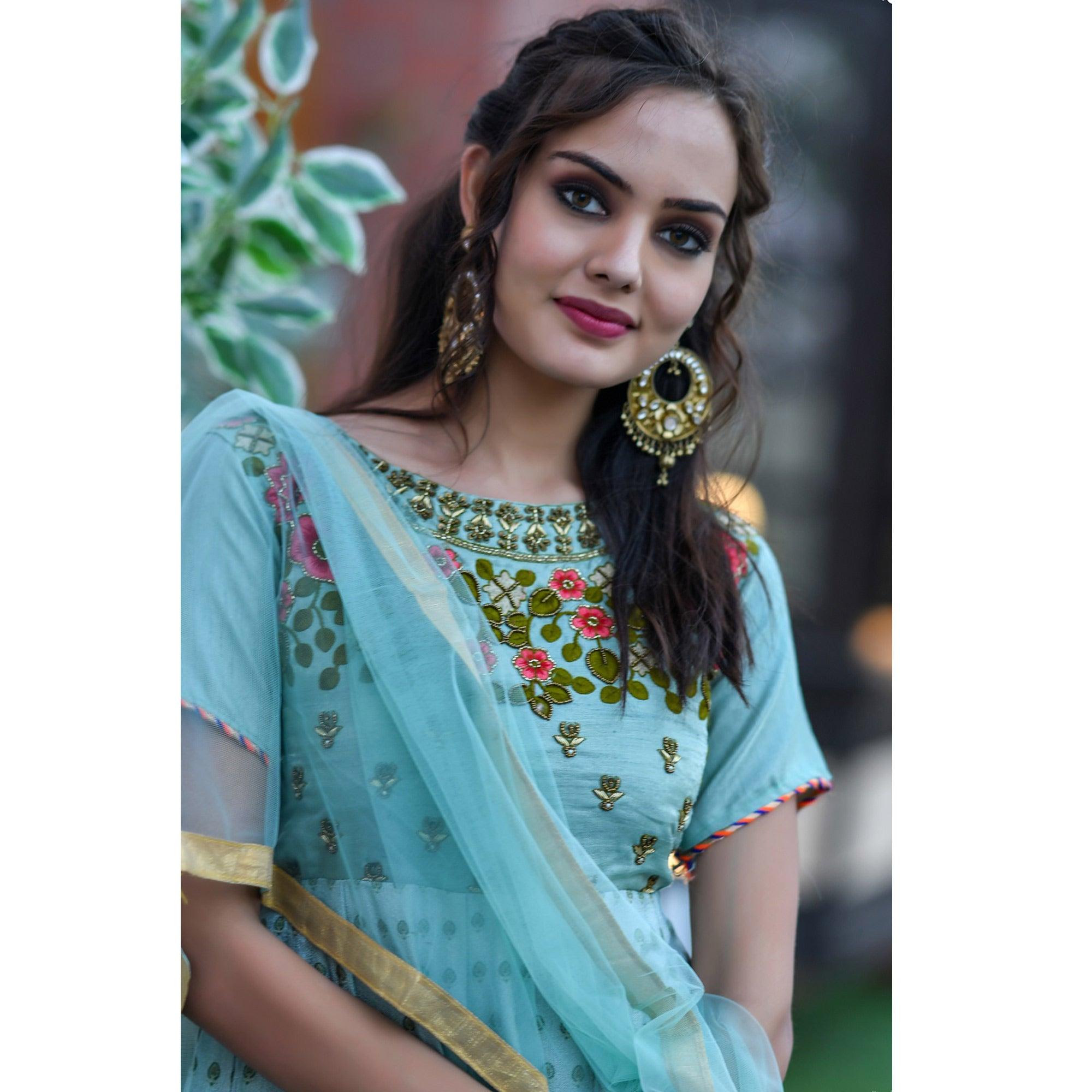 Charming Mint Blue Colored Partywear Embroidered Silk Gown - Peachmode