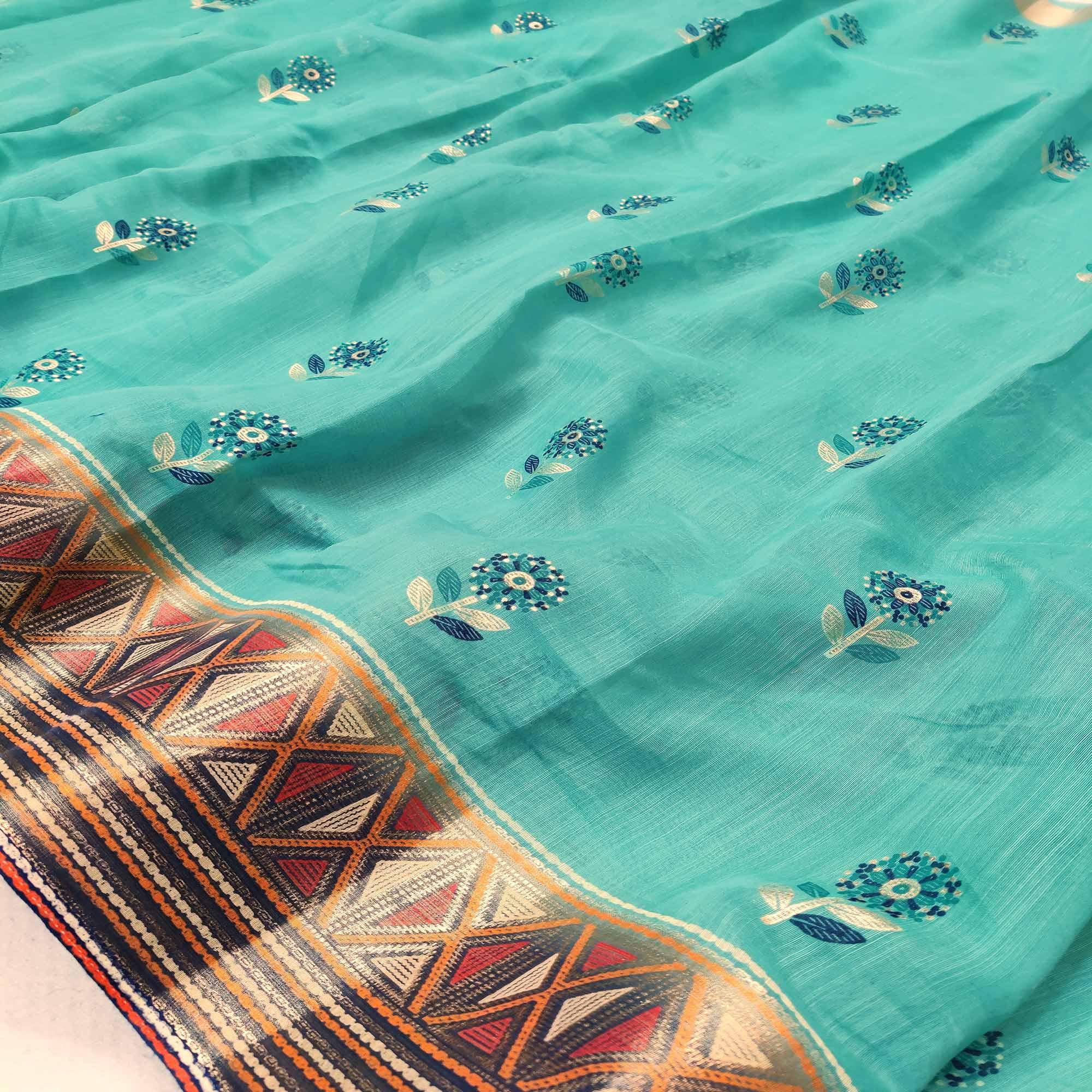 Charming Sea Green Colored Festive Wear Foil Printed Cotton Silk Saree - Peachmode