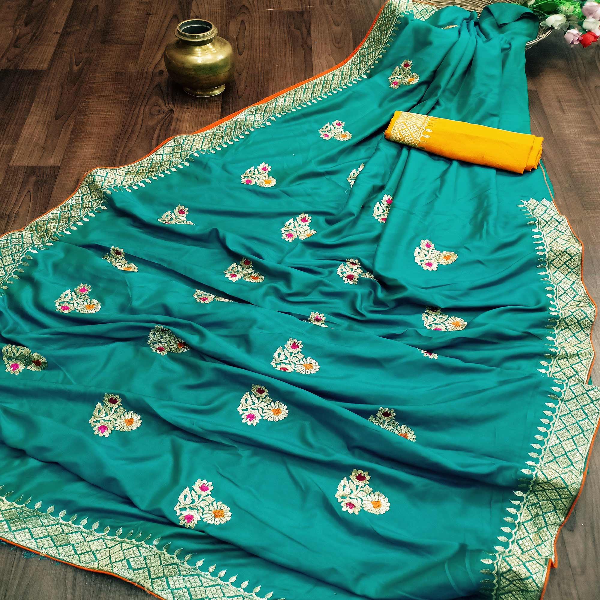 Charming Turquoise Colored Festive Wear Woven Dola Silk Saree - Peachmode