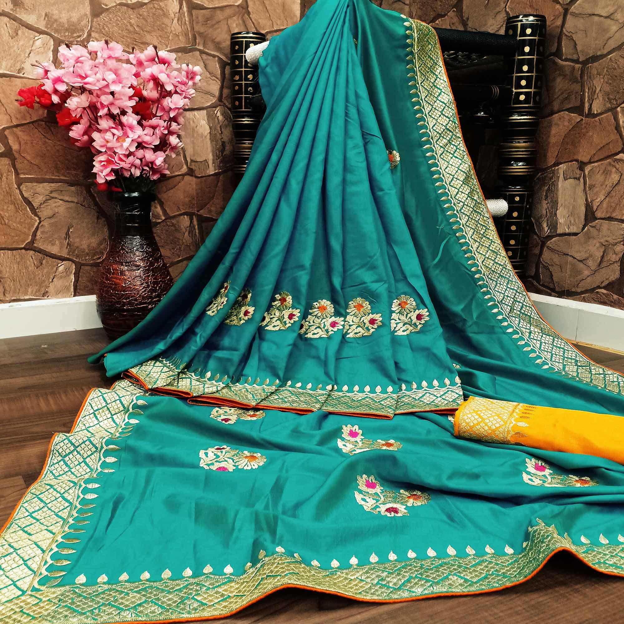 Charming Turquoise Colored Festive Wear Woven Dola Silk Saree - Peachmode