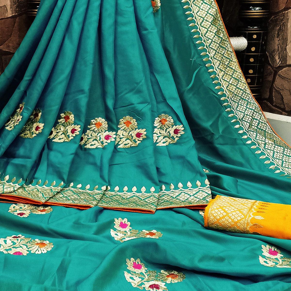 Charming Turquoise Colored Festive Wear Woven Dola Silk Saree - Peachmode