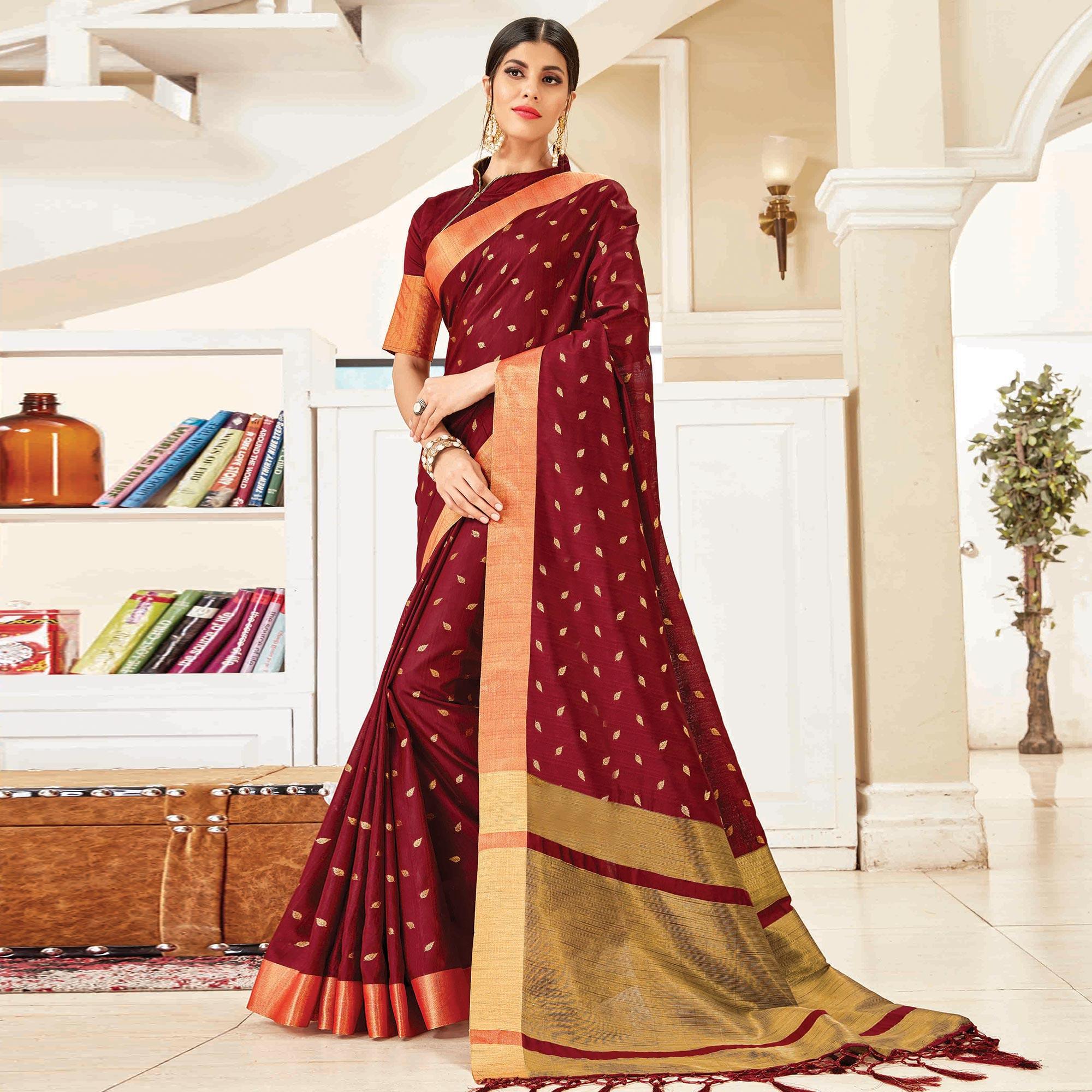 Charming Wine Colored Festive Wear Woven Handloom Silk Saree With Tassels - Peachmode
