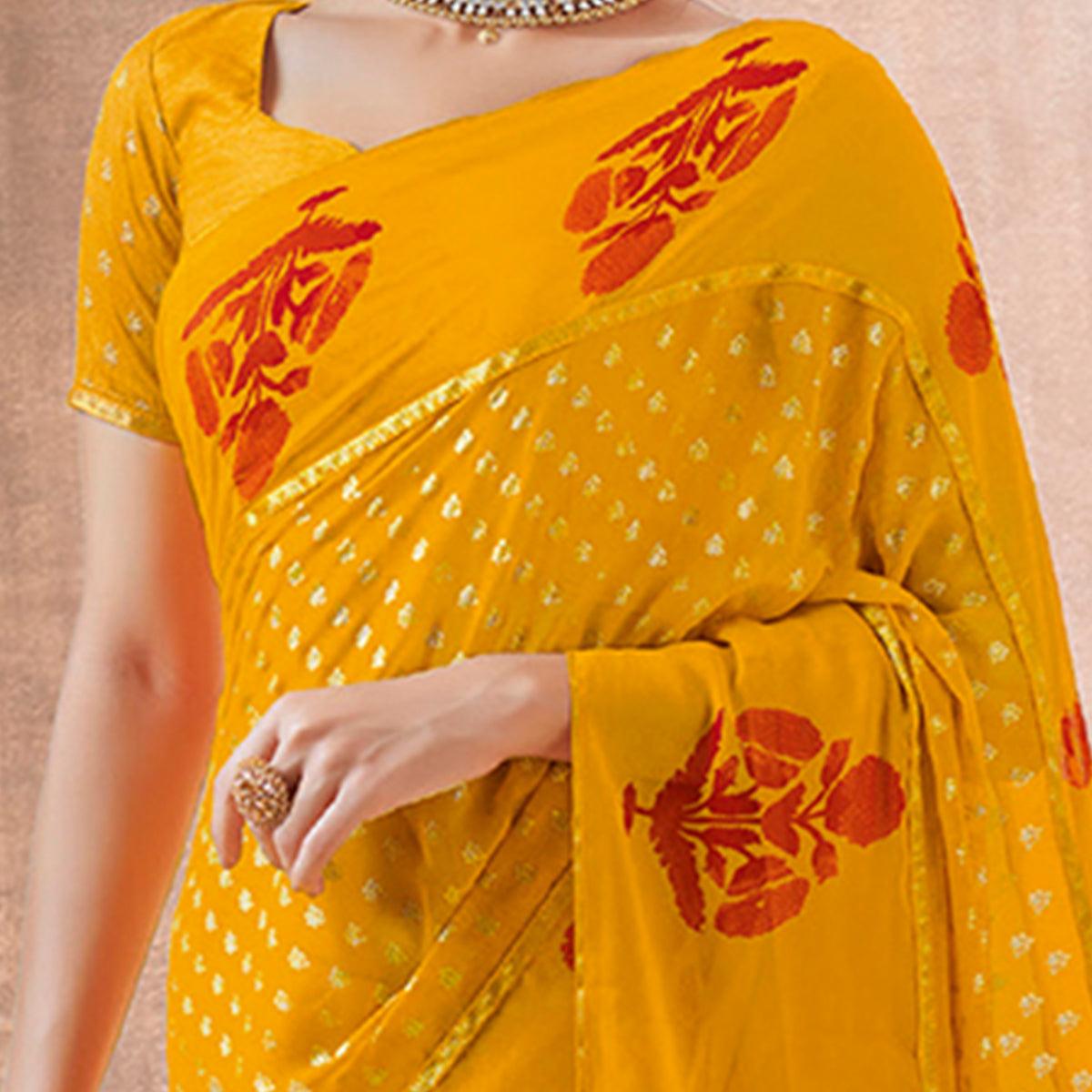 Charming Yellow Colored Festive Wear Foil Printed Georgette Saree - Peachmode