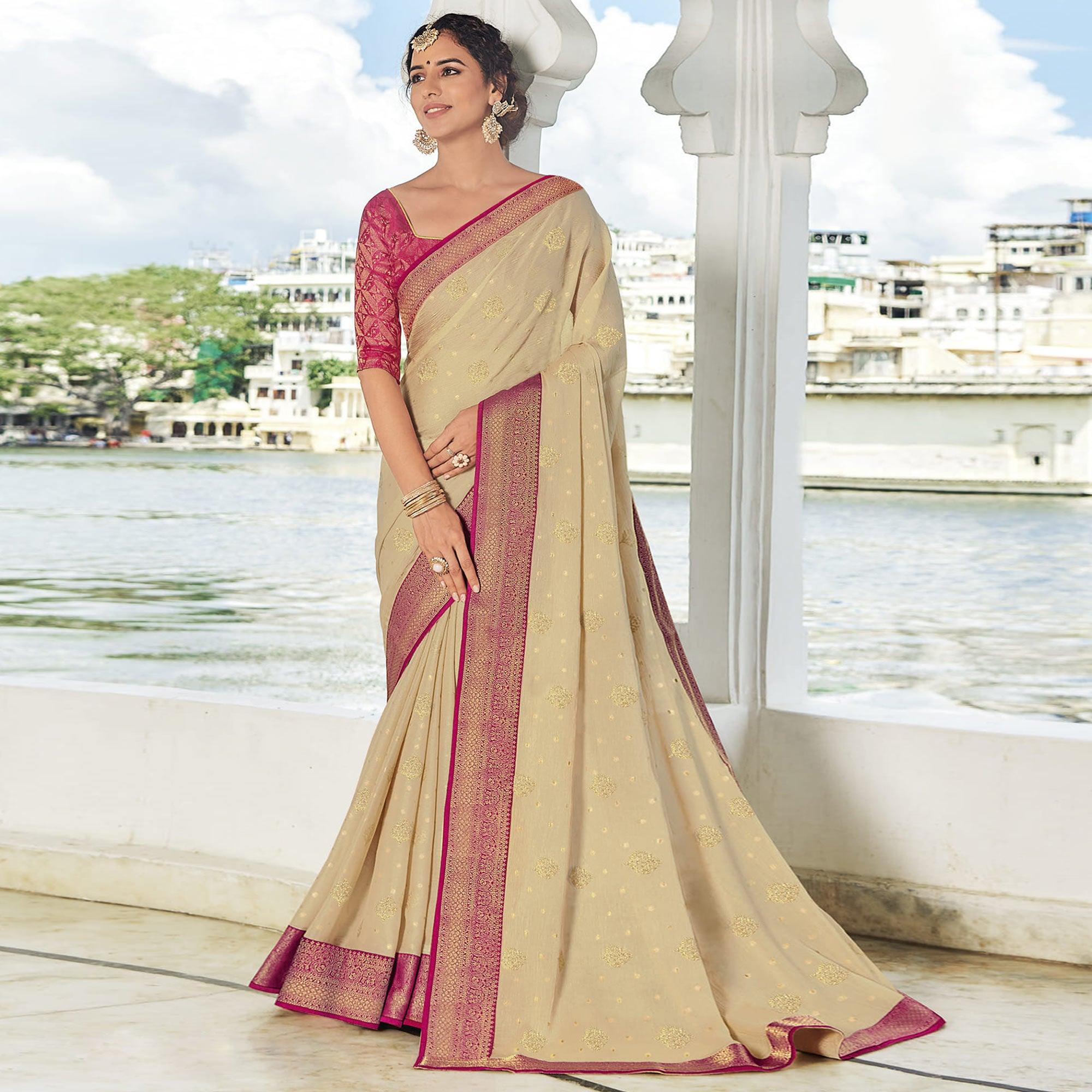 Chikoo Festive Wear Woven Brasso Saree - Peachmode