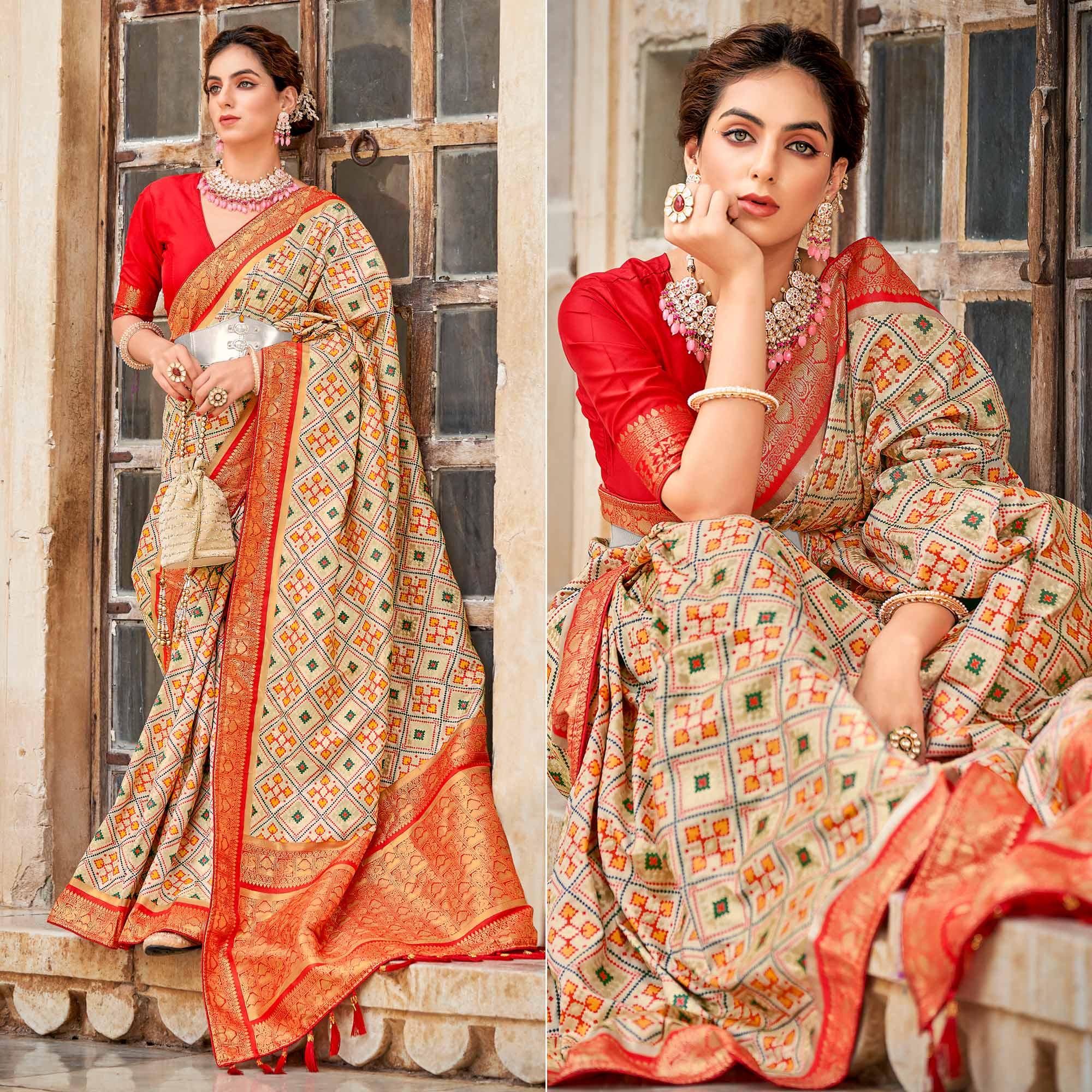 Chikoo Woven Art Silk Patola Saree With Tassels - Peachmode