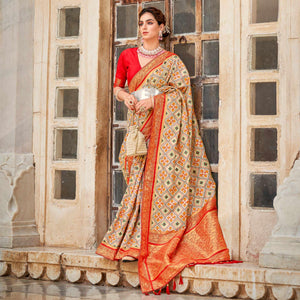 Chikoo Woven Art Silk Patola Saree With Tassels - Peachmode