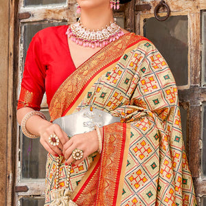 Chikoo Woven Art Silk Patola Saree With Tassels - Peachmode