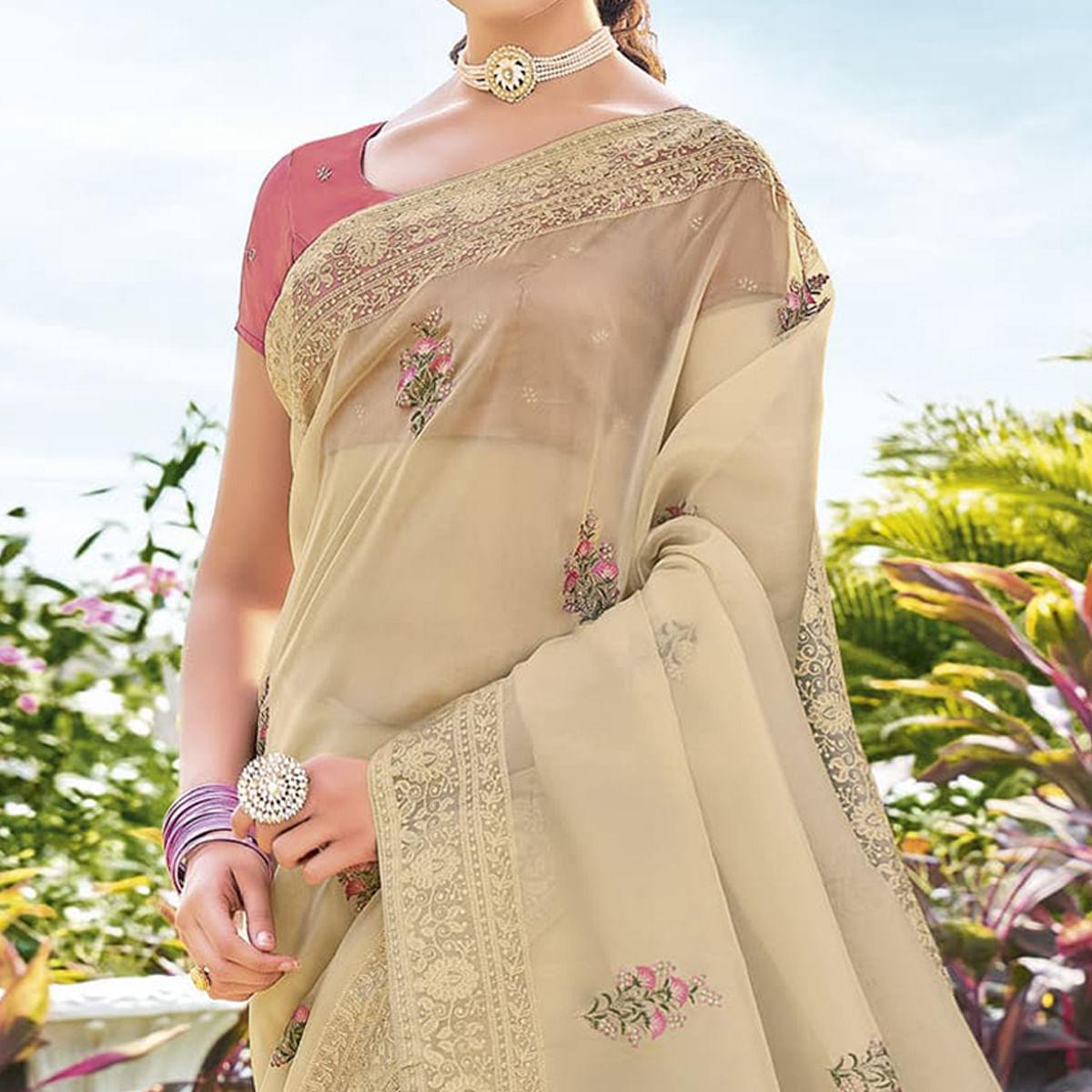 Chiku Embroidered Georgette Saree - Peachmode